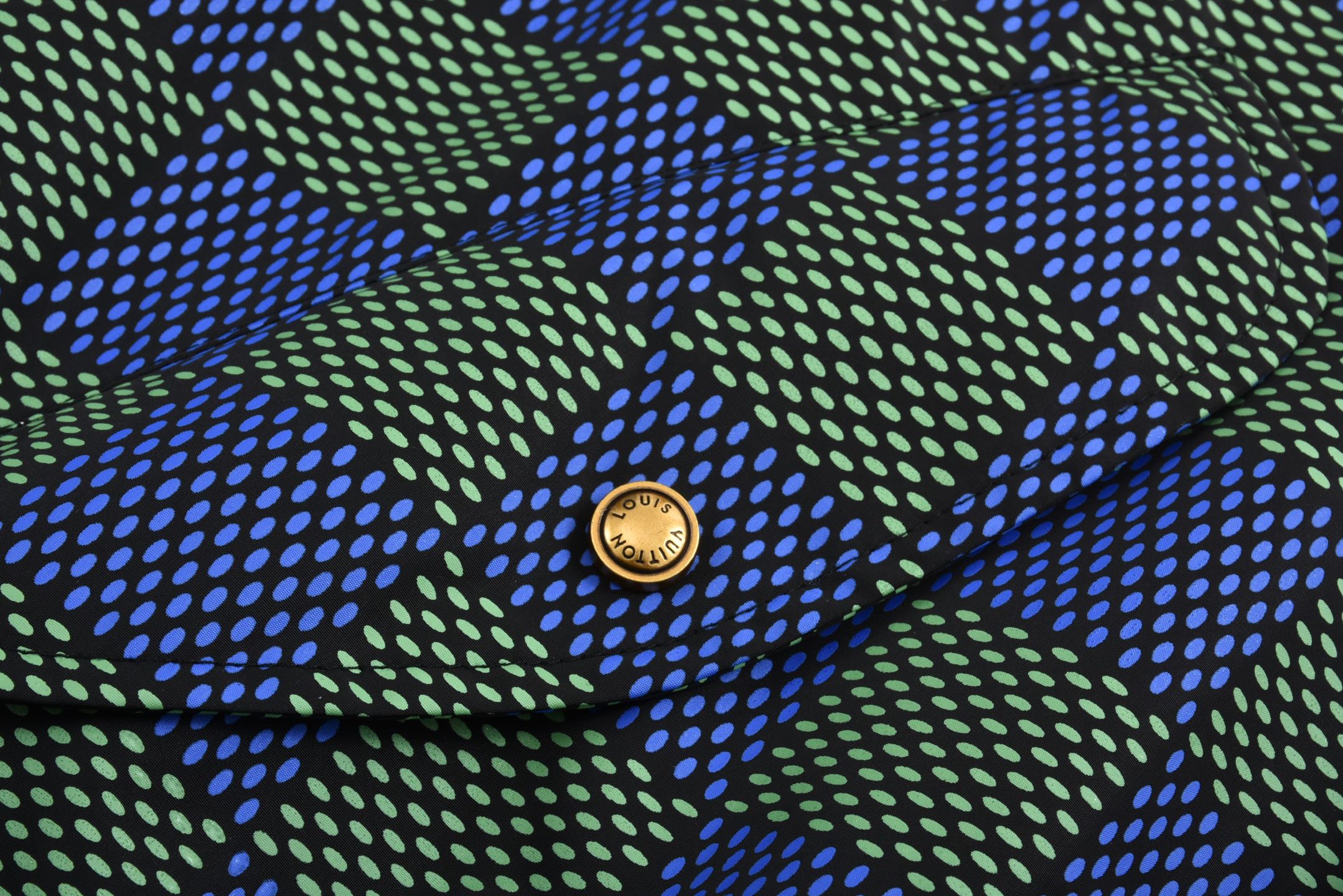 Checkerboard reversible zip-up jacket