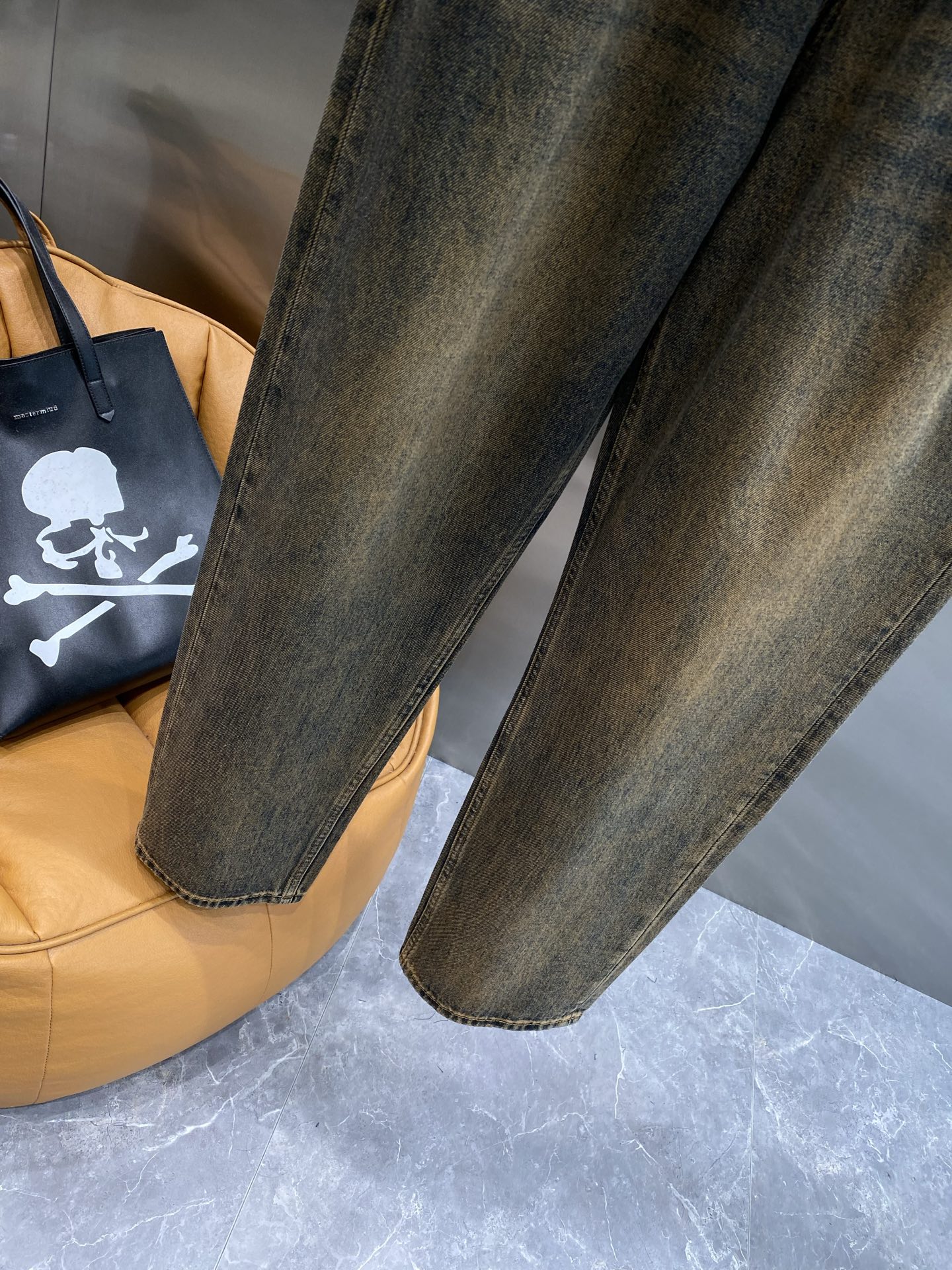 Distressed washed denim jeans