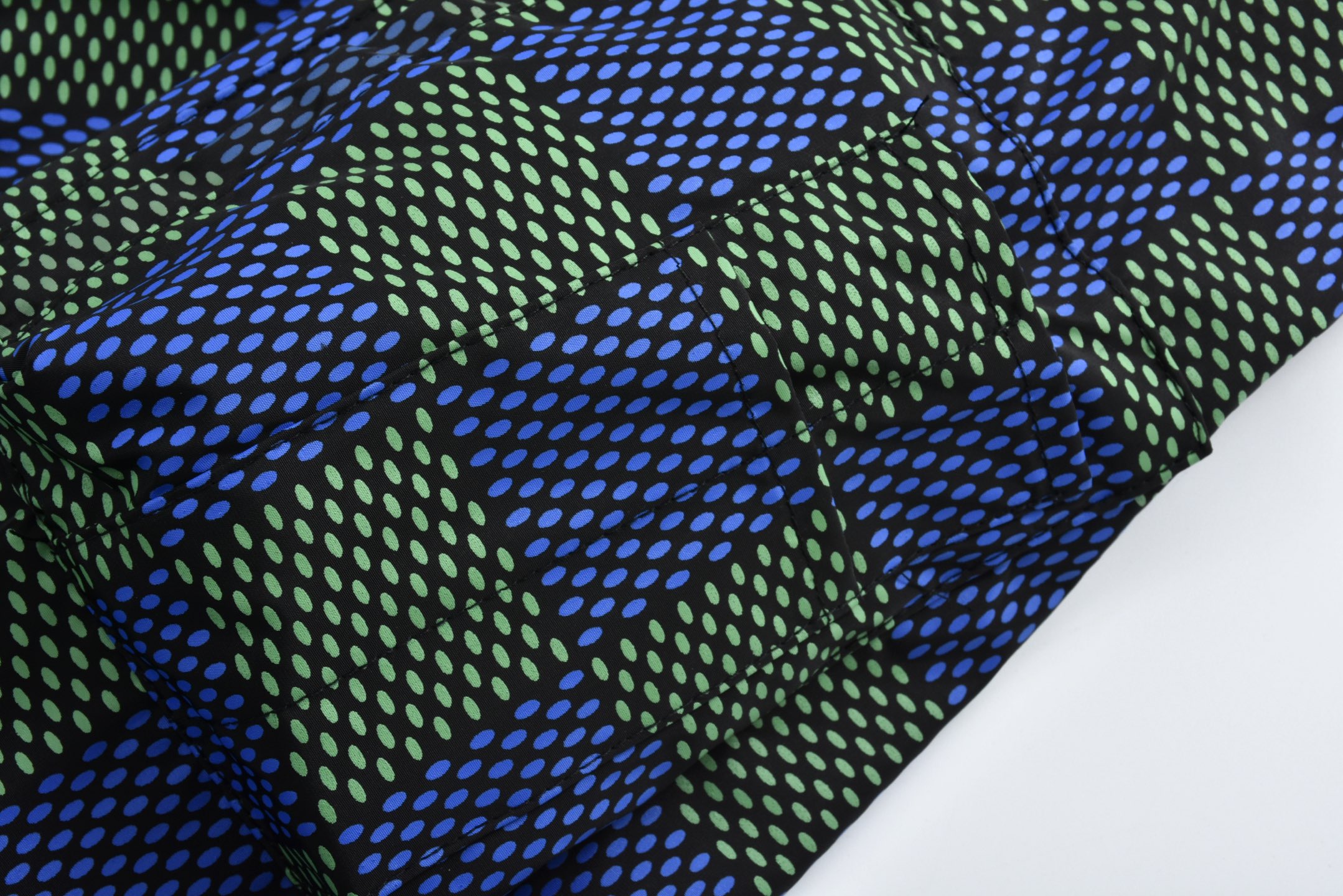 Checkerboard reversible zip-up jacket