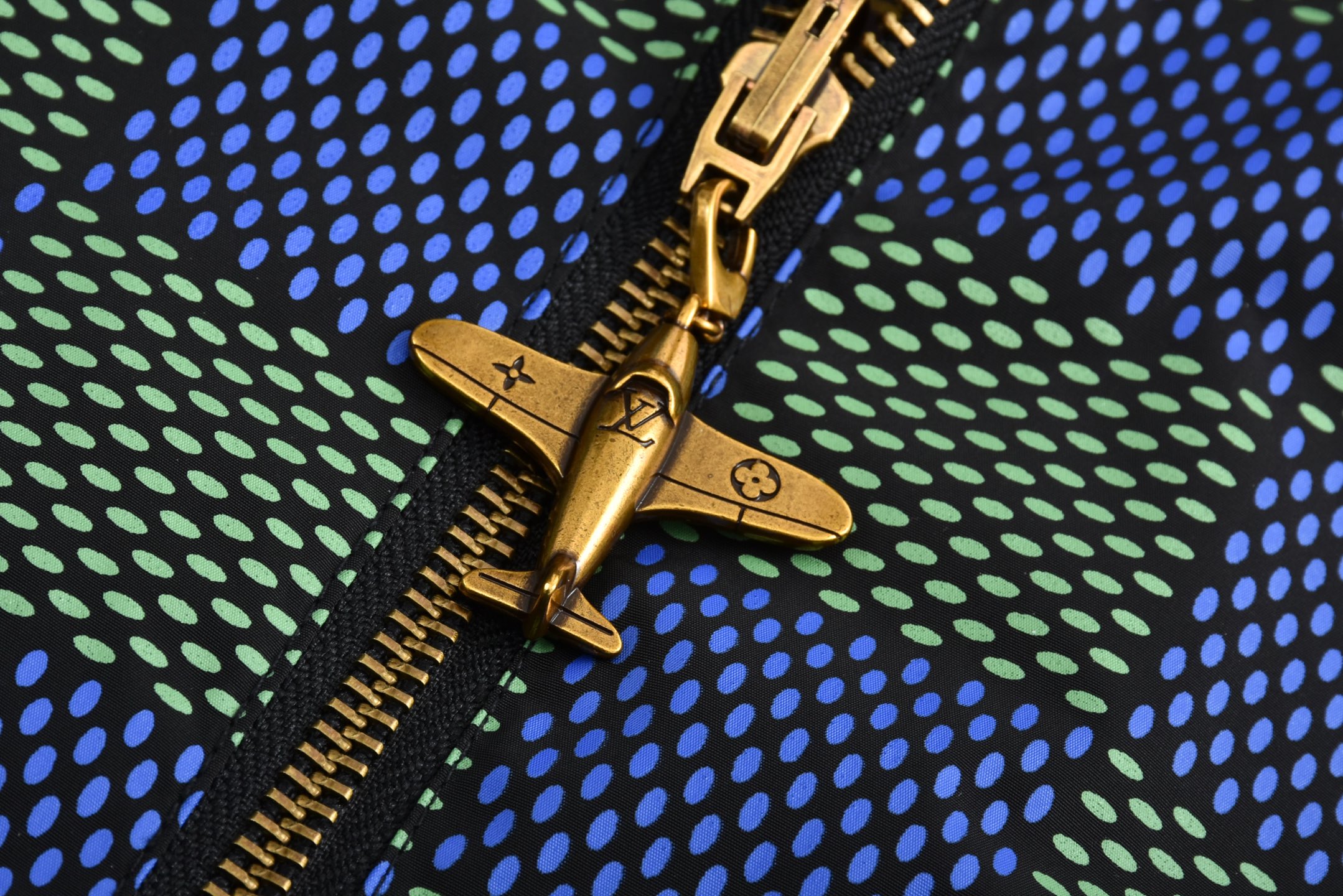 Checkerboard reversible zip-up jacket