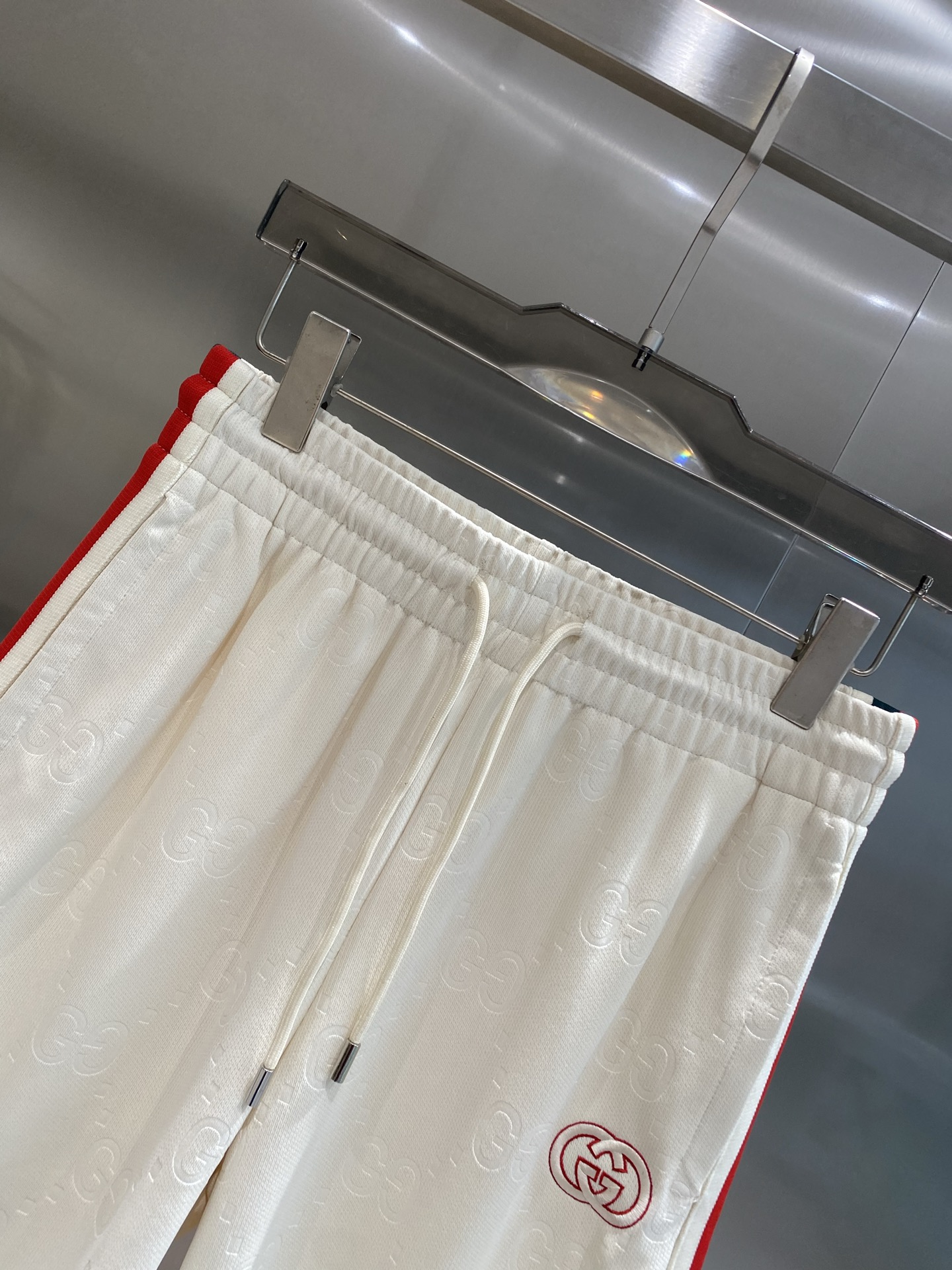 Red and white striped side panel shorts