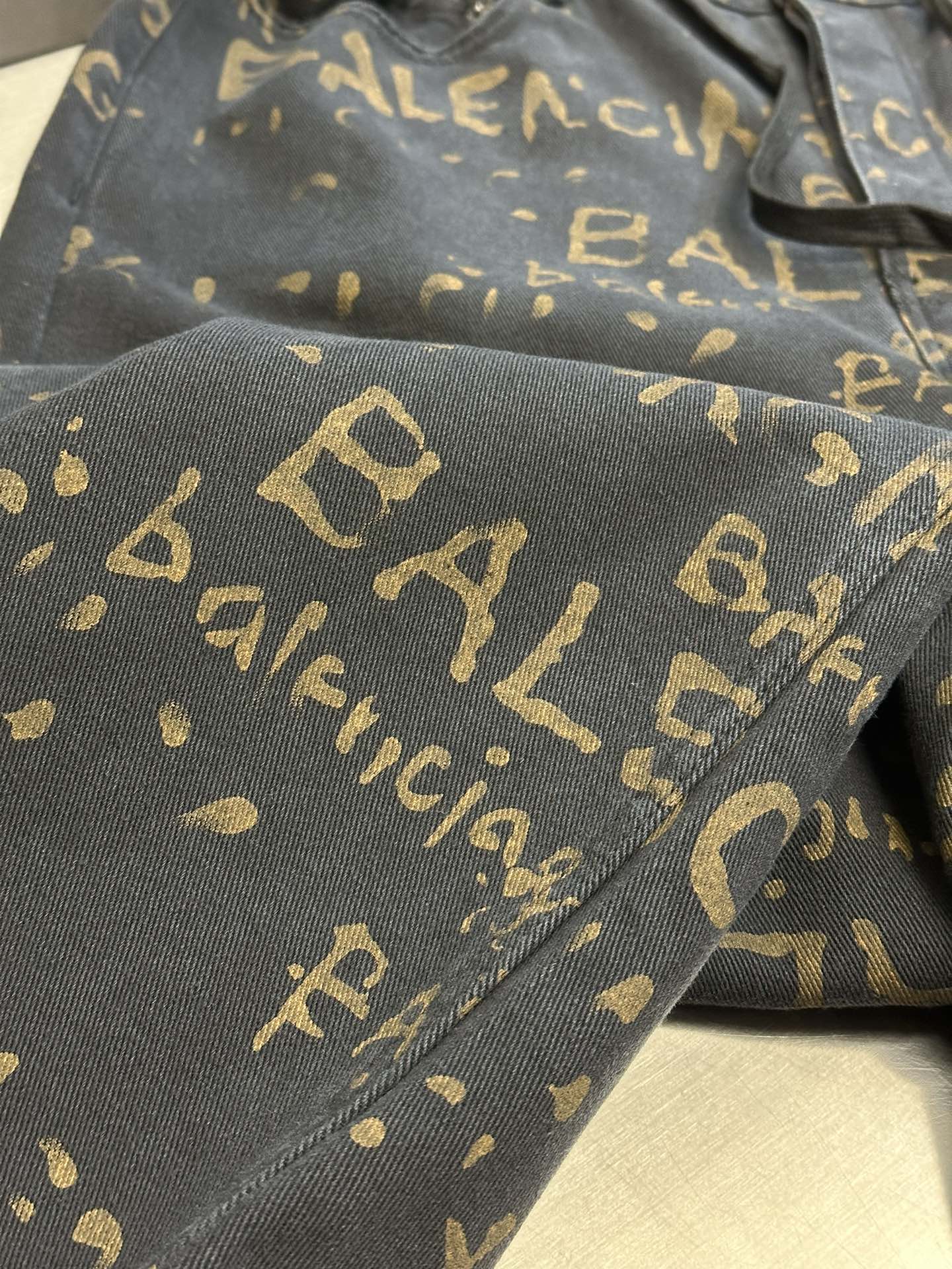 Washed All-Over Printed Jeans