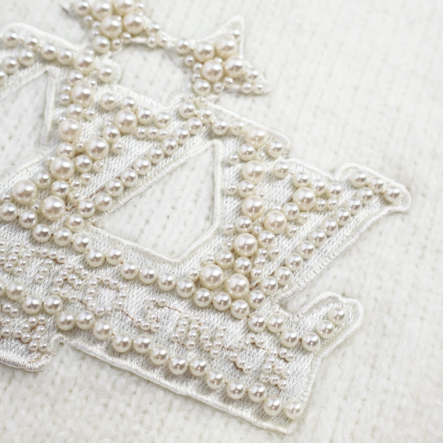 Embroidered pearl logo knitted sweater