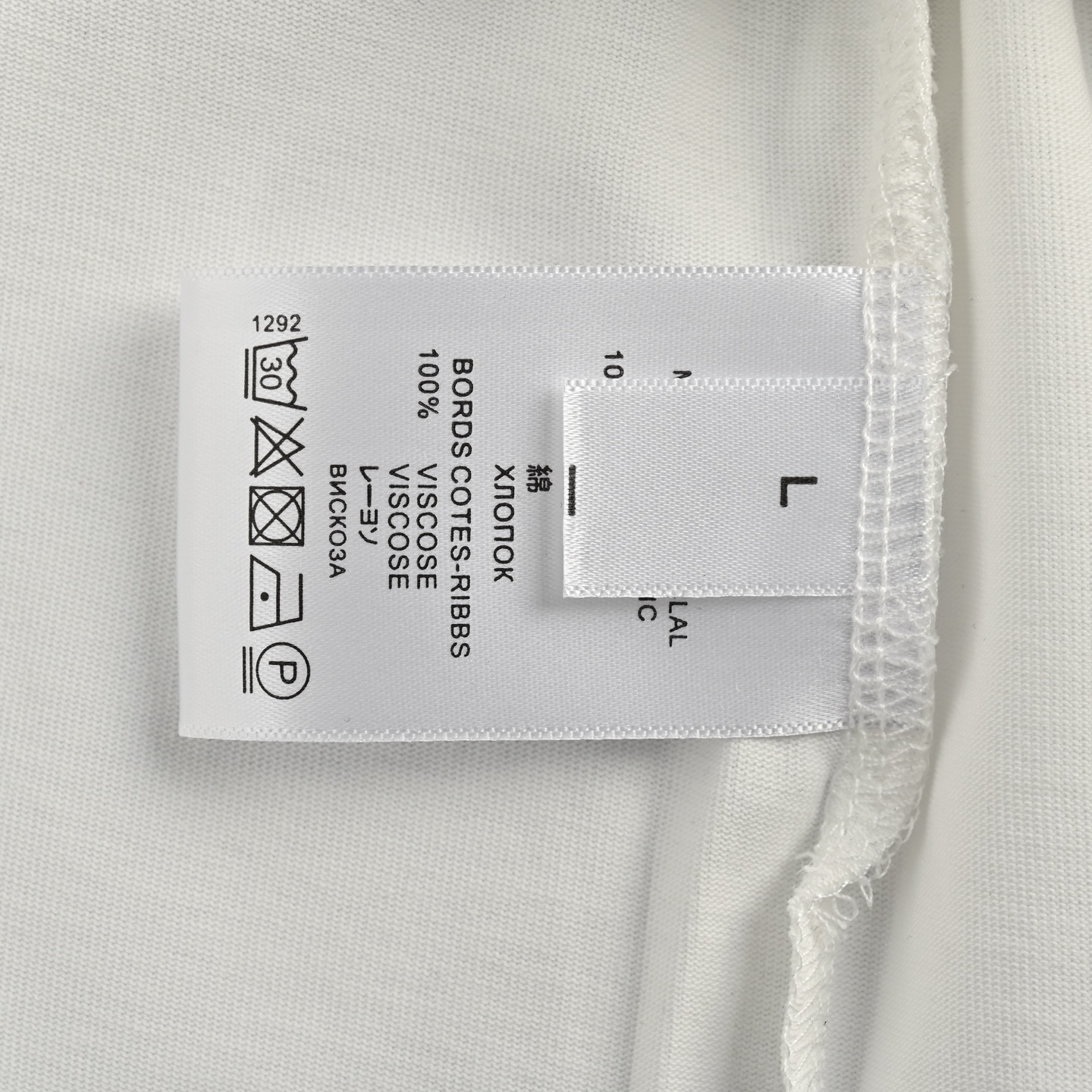 Back embroidered subtle pattern T-shirt