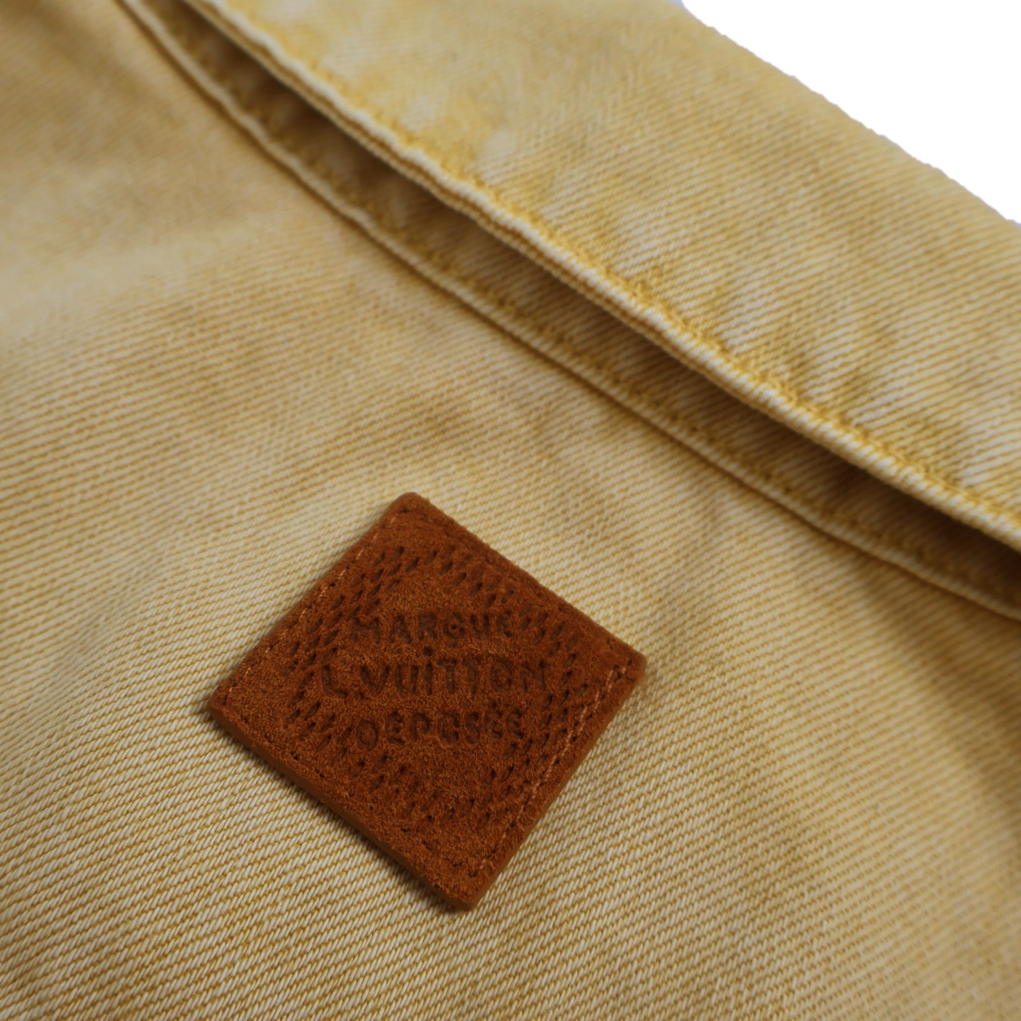 Denim jacket with embossed pockets