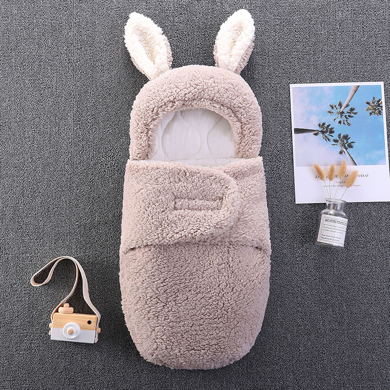 Baby bag held by newborn sleeping bag, thickened in autumn and winter