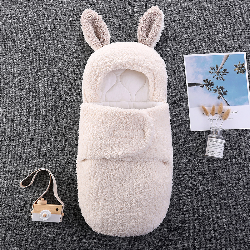 Baby bag held by newborn sleeping bag, thickened in autumn and winter