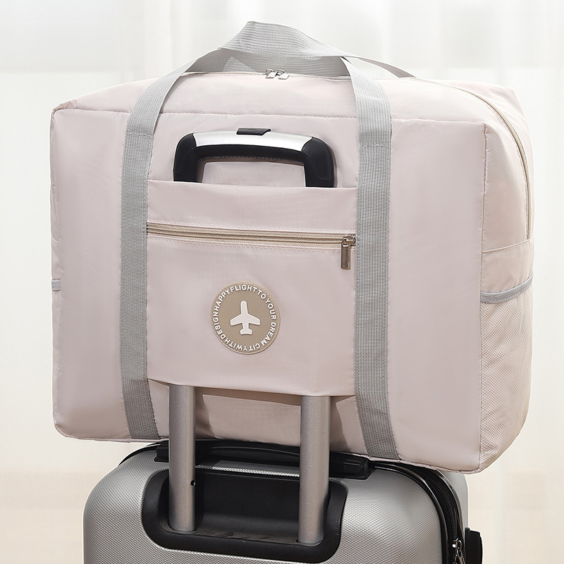 Round label airplane bag with inner fabric double-layer travel bag folding storage bag portable clothing storage