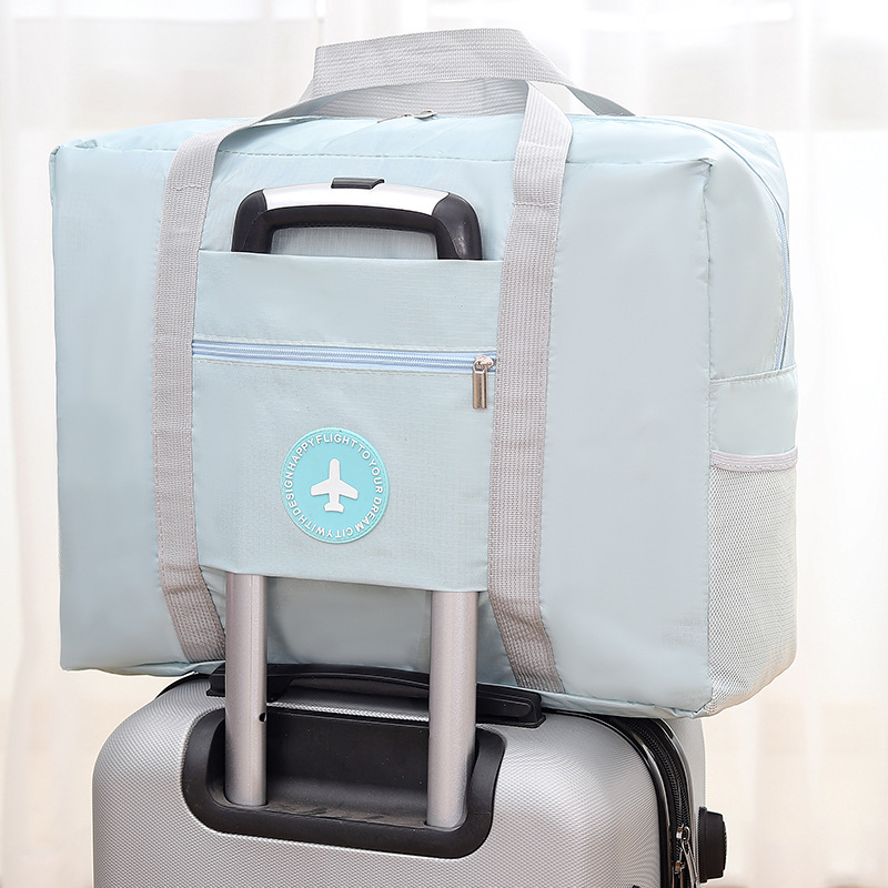 Round label airplane bag with inner fabric double-layer travel bag folding storage bag portable clothing storage