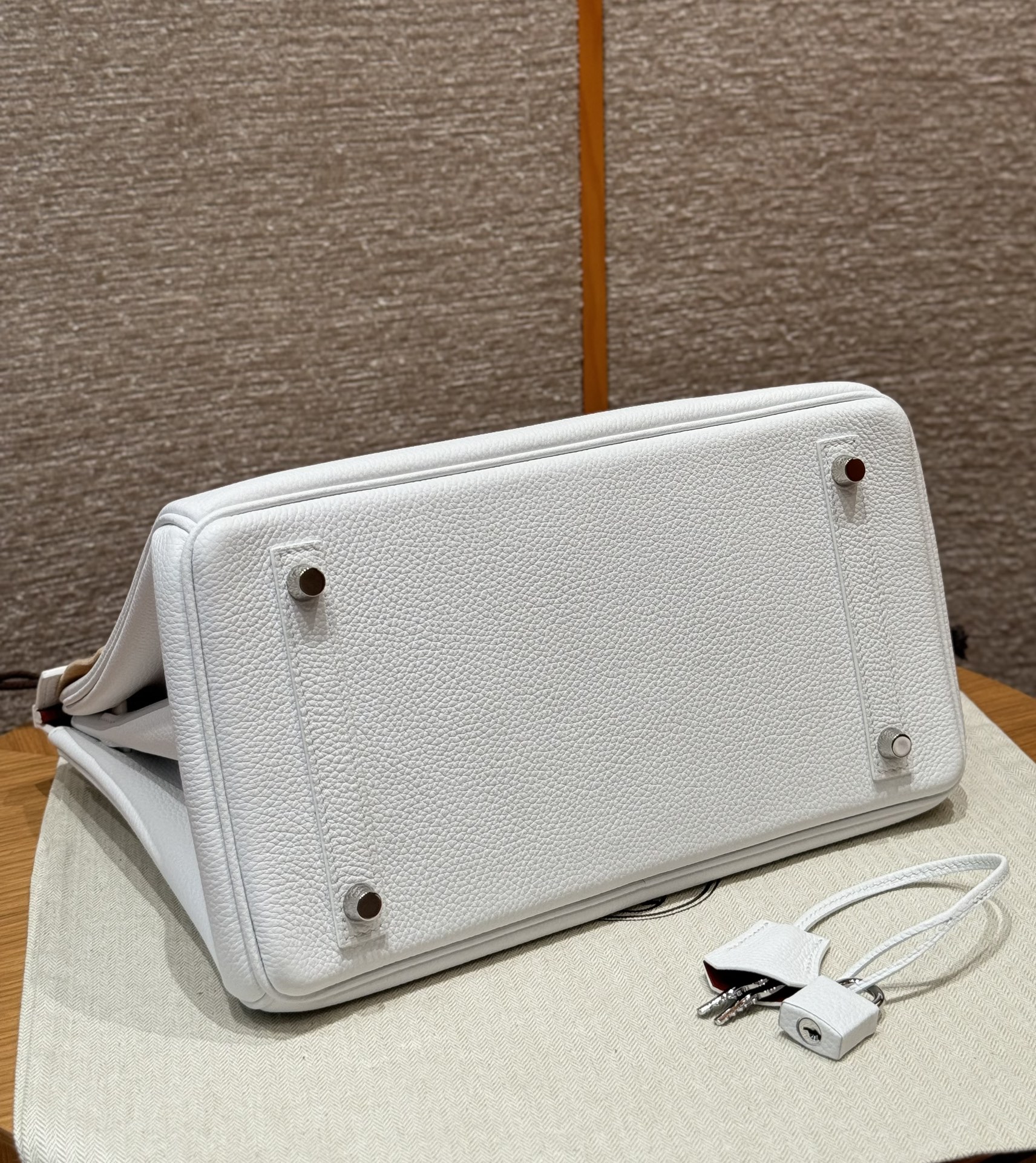 Hermès Birkin 30 white exterior and poppy orange lining