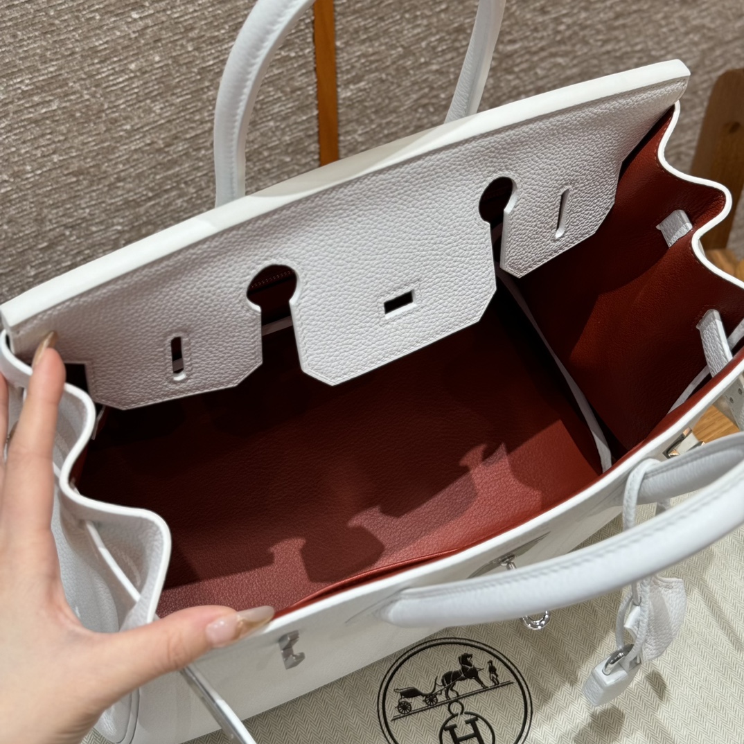 Hermès Birkin 30 white exterior and poppy orange lining