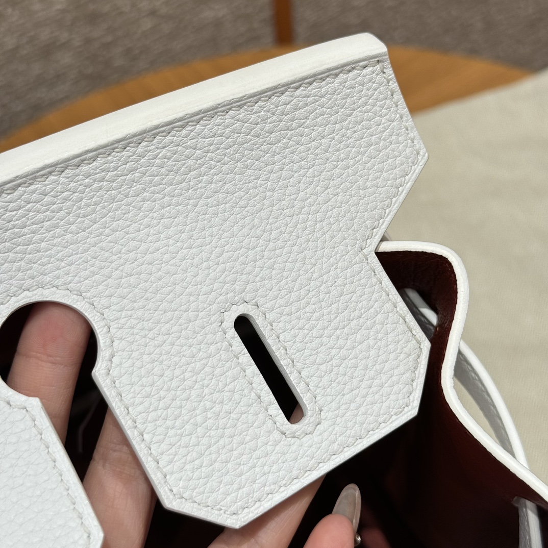 Hermès Birkin 30 white exterior and poppy orange lining