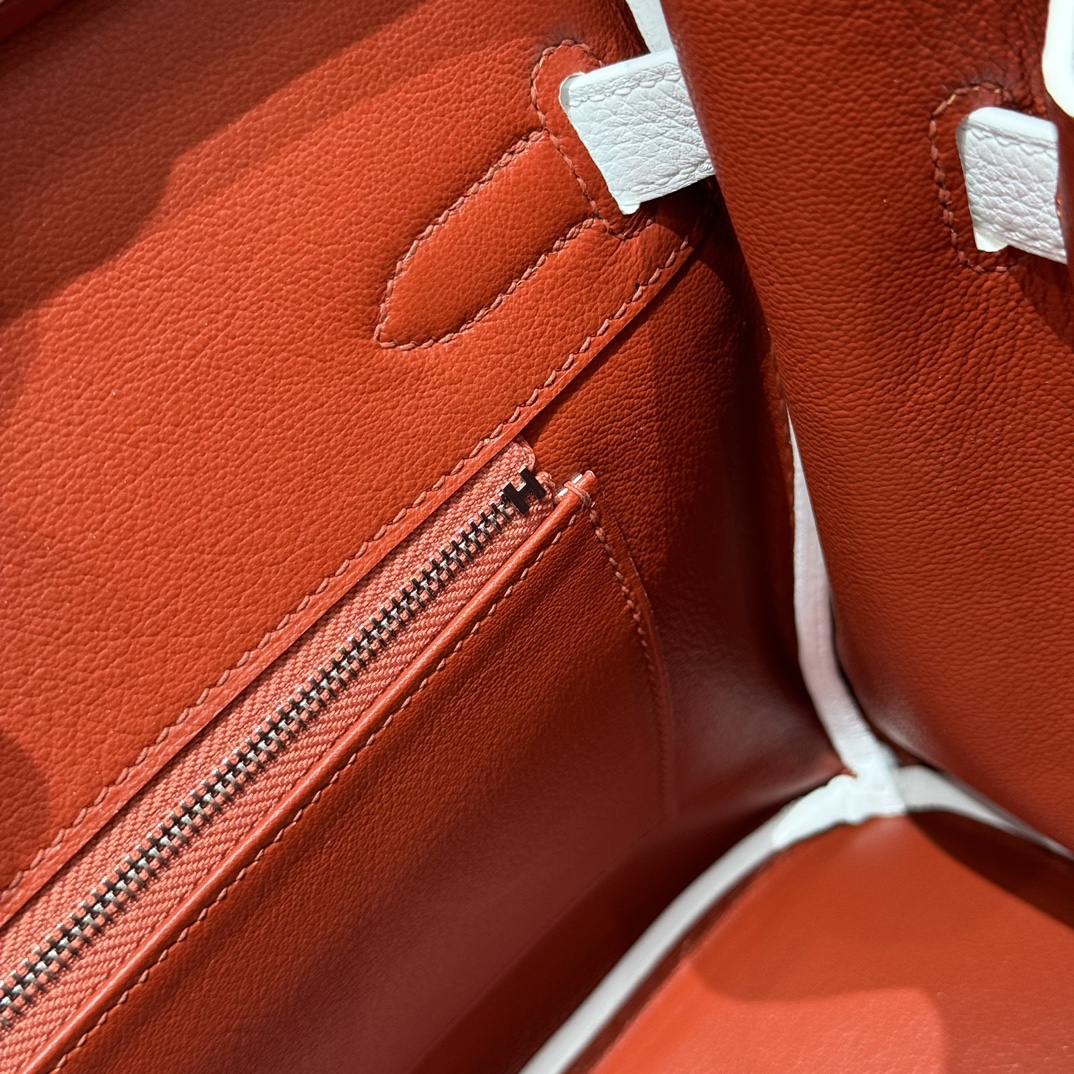 Hermès Birkin 30 white exterior and poppy orange lining