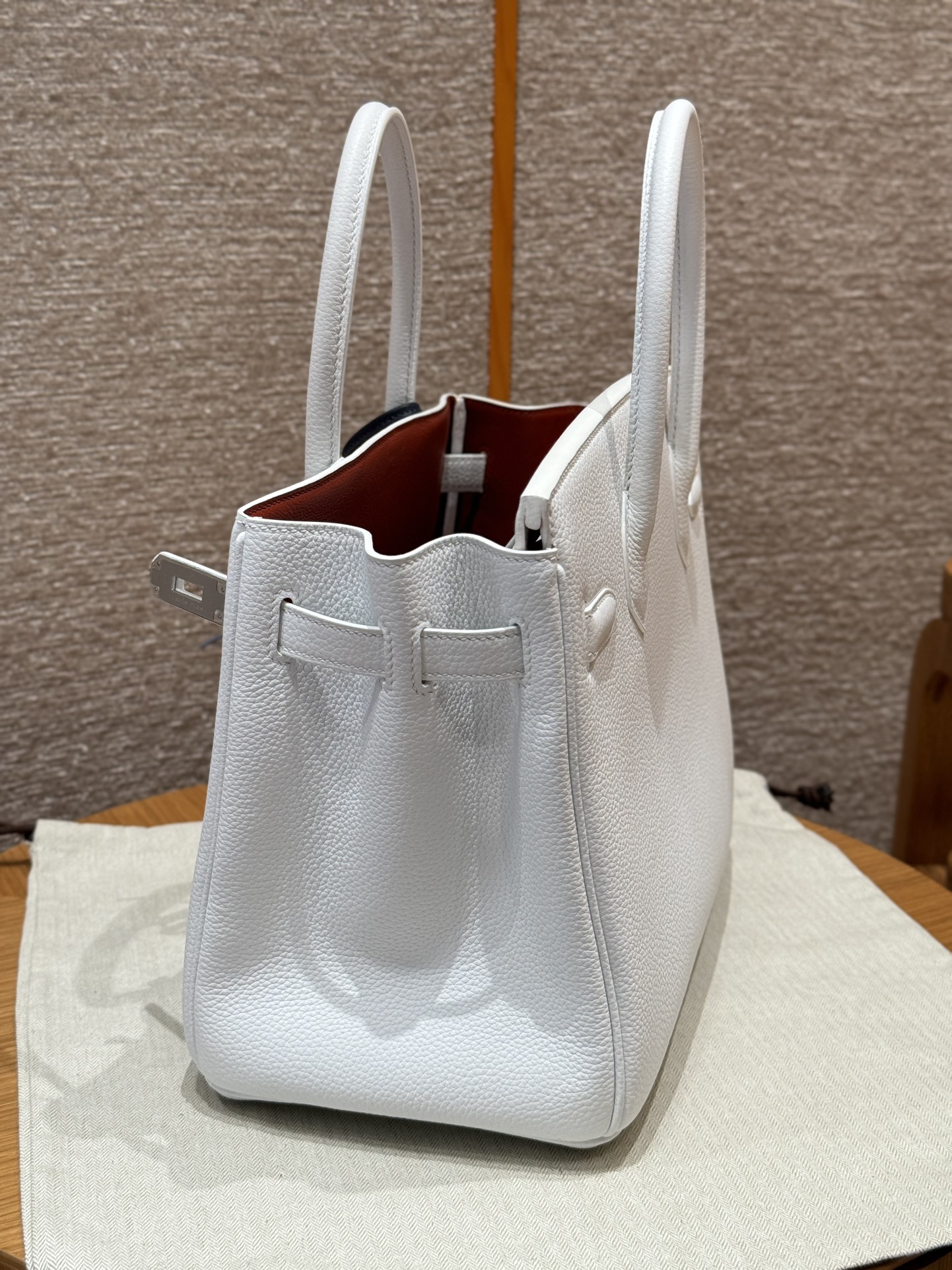 Hermès Birkin 30 white exterior and poppy orange lining