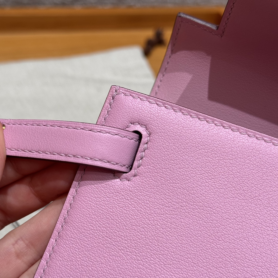 Hermès  Kelly Pochette 1 mauve Swift