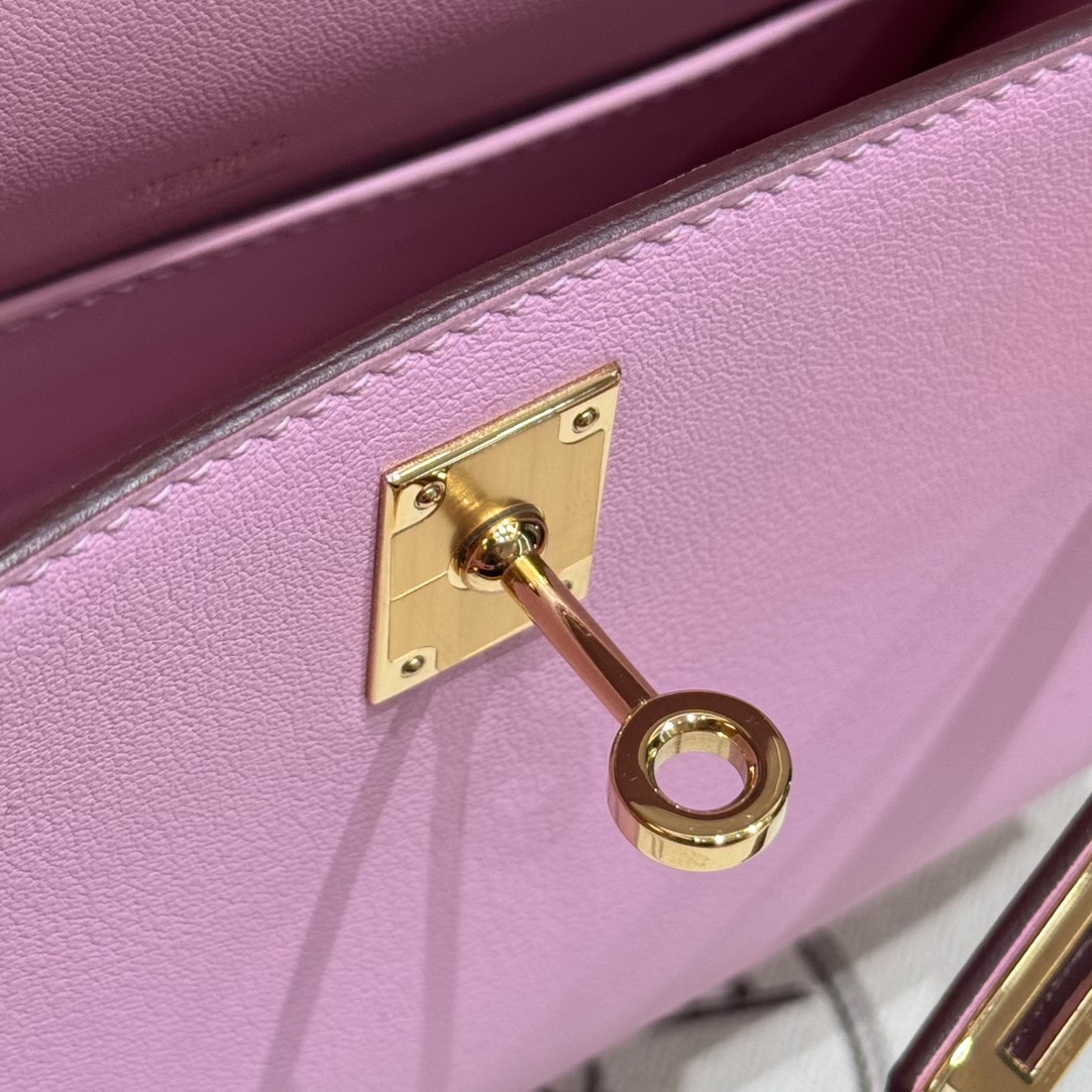 Hermès  Kelly Pochette 1 mauve Swift