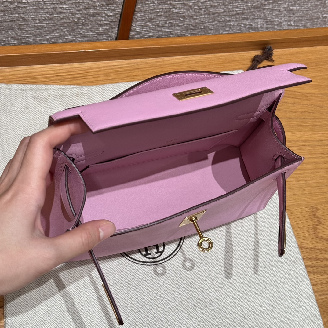 Hermès  Kelly Pochette 1 mauve Swift