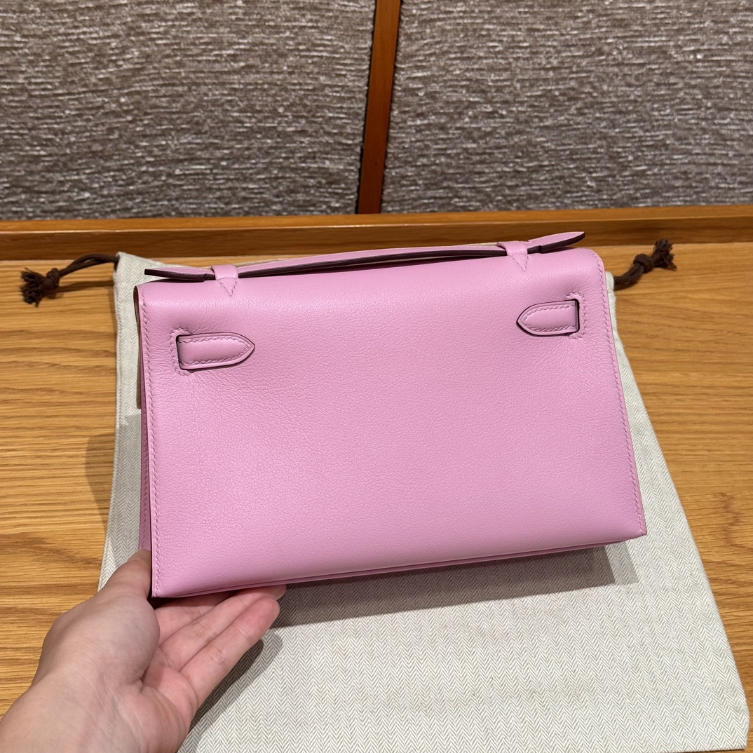 Hermès  Kelly Pochette 1 mauve Swift