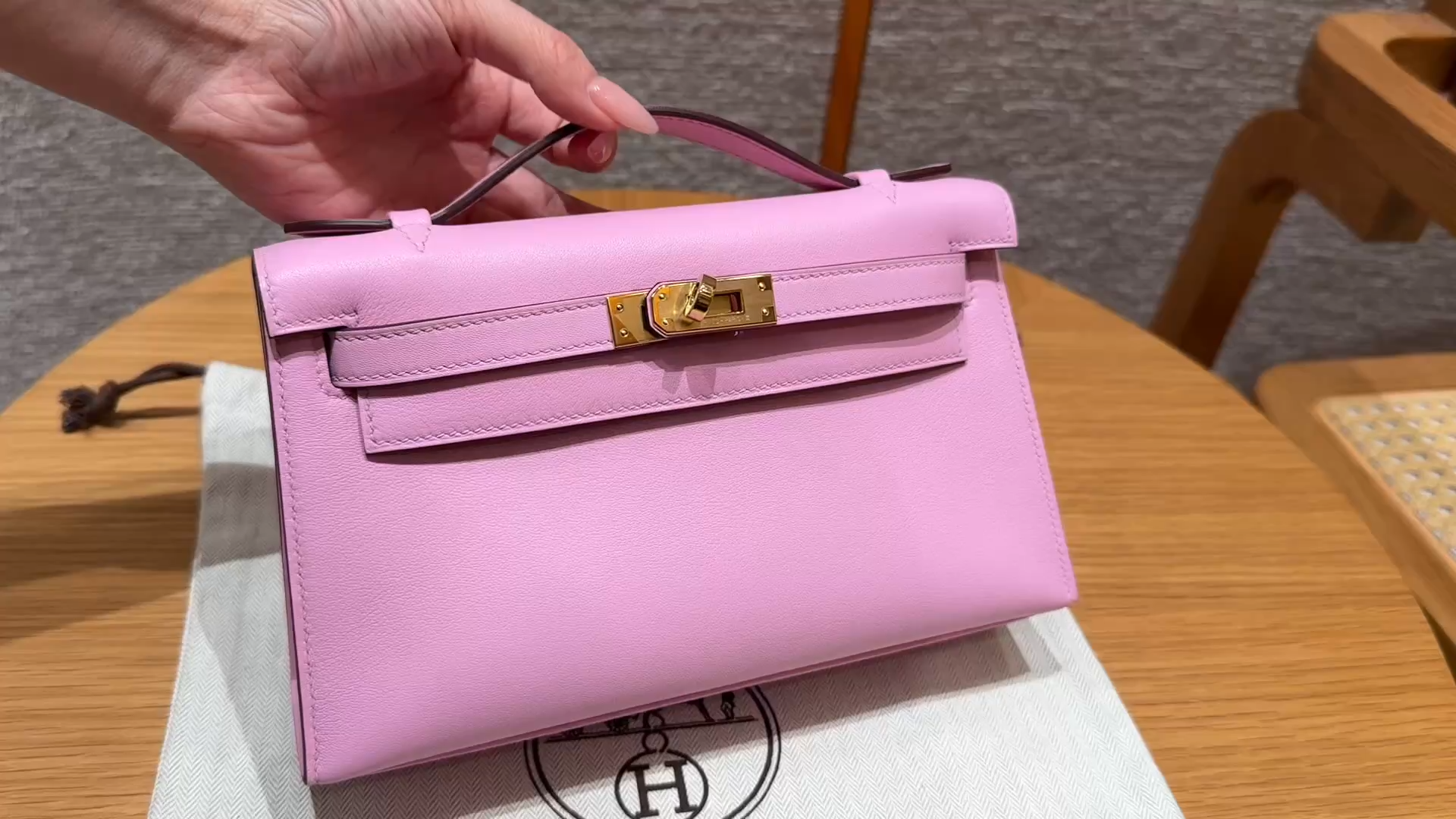 Hermès  Kelly Pochette 1 mauve Swift