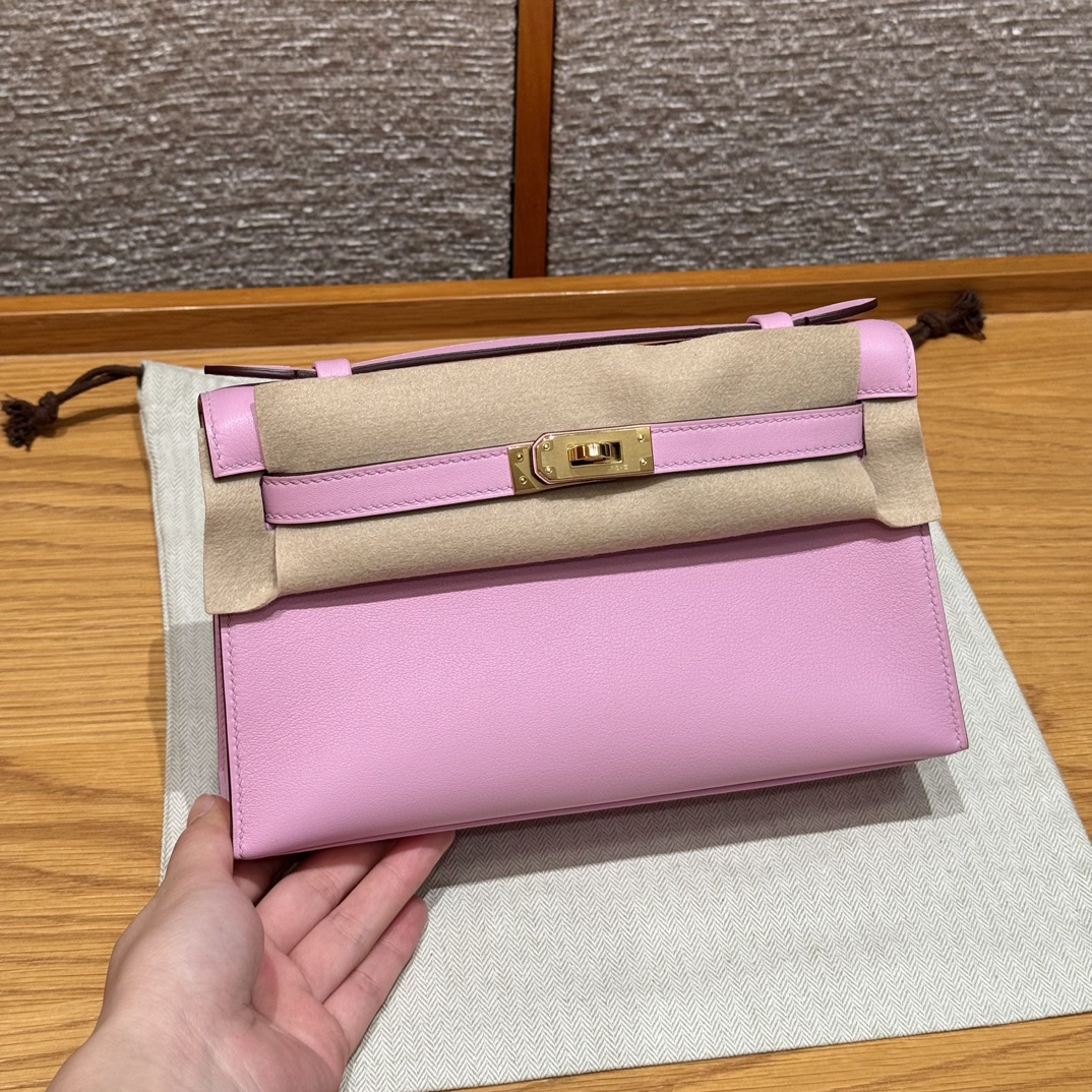 Hermès  Kelly Pochette 1 mauve Swift