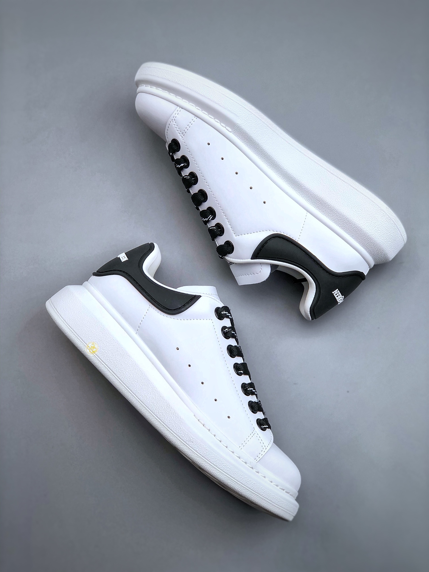 Alexander McQueen Oversized Leather Lace-Up Low-Top Fashion Sneaker – Unisex, White & Black