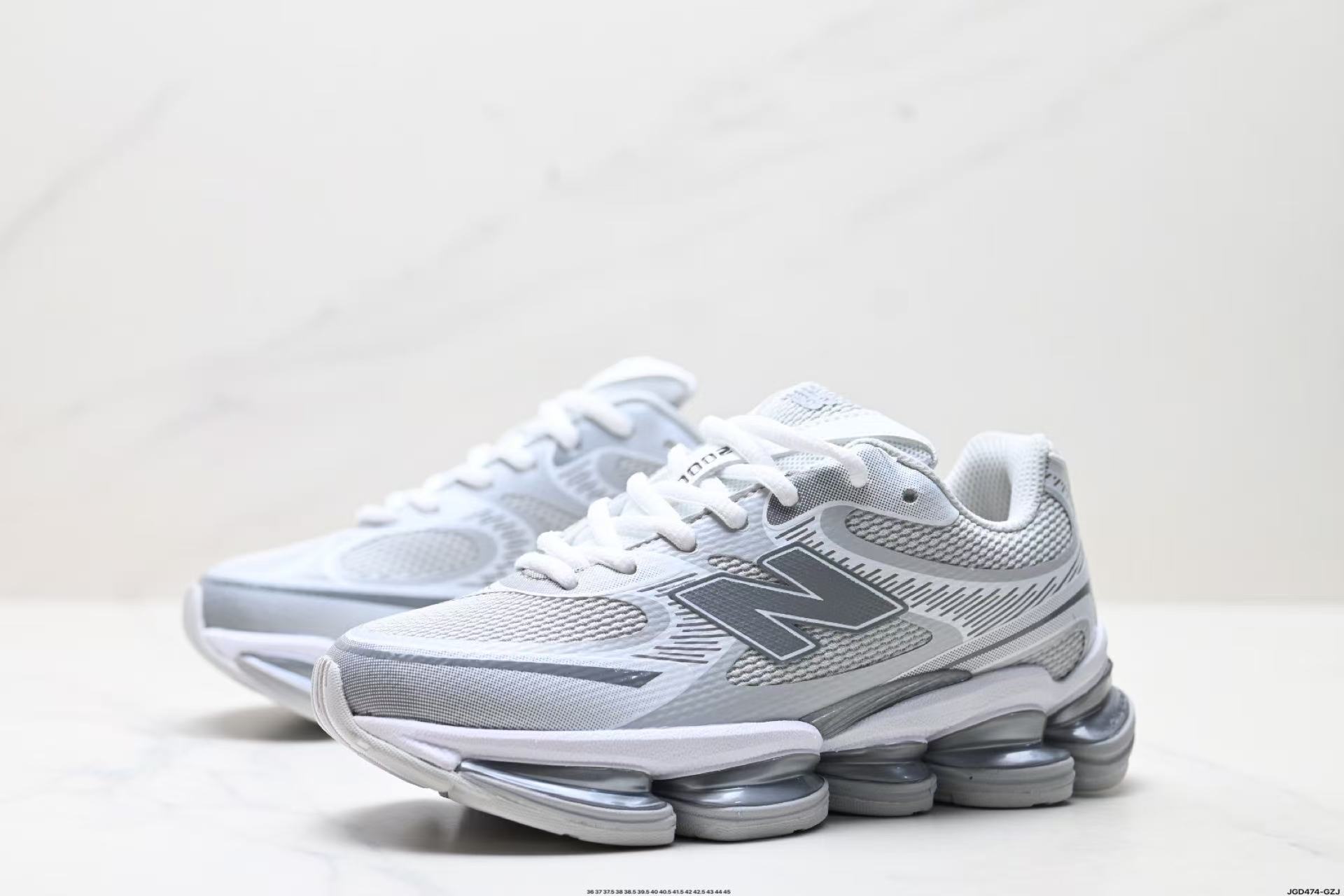 New Balance NB 2000 Unisex Low-Top Sneakers – White & Silver | Comfortable, Durable & Effortlessly Stylish