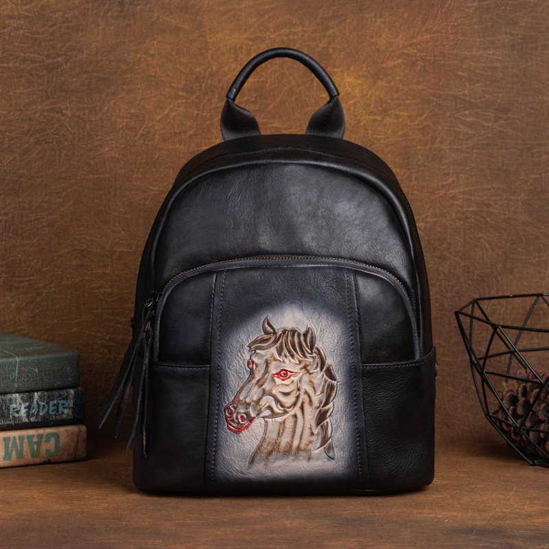 Vintage Black Leather Backpack with Carved Horse Motif