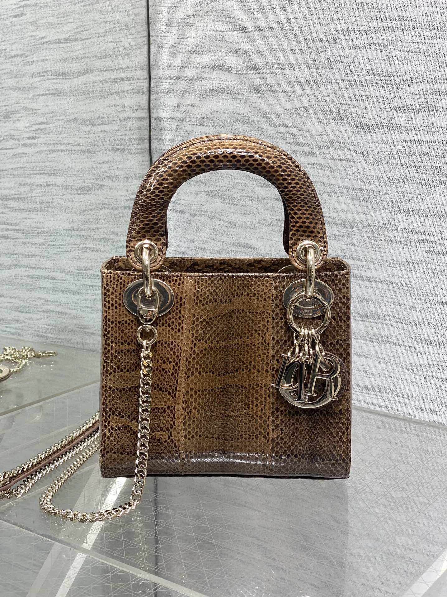 Lady Diana's three-compartment rare snake skin handbag