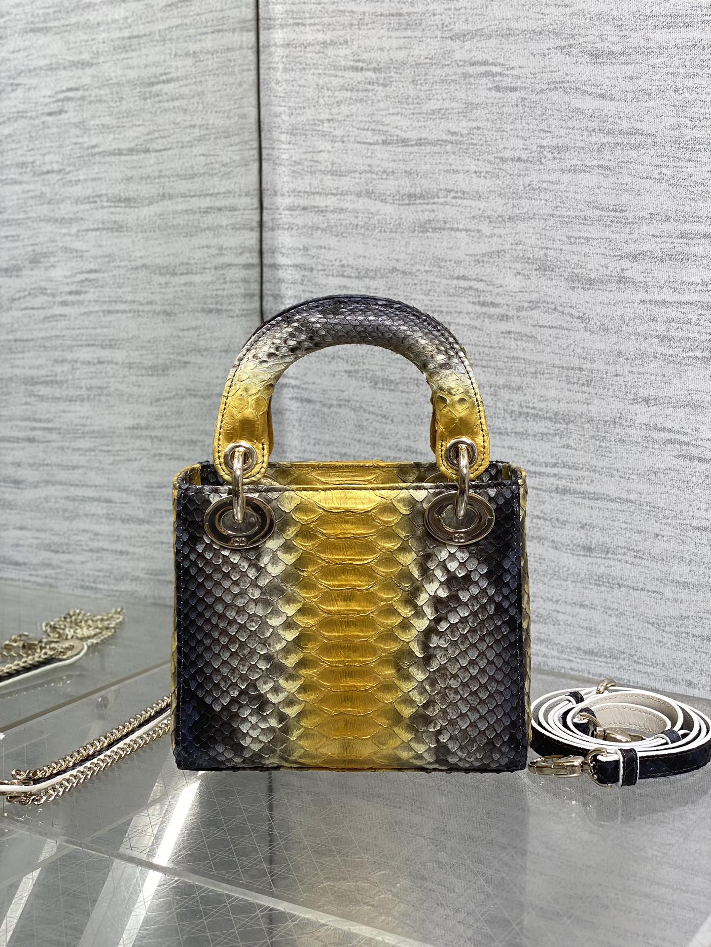 Lady Diana's three-compartment rare snake skin handbag