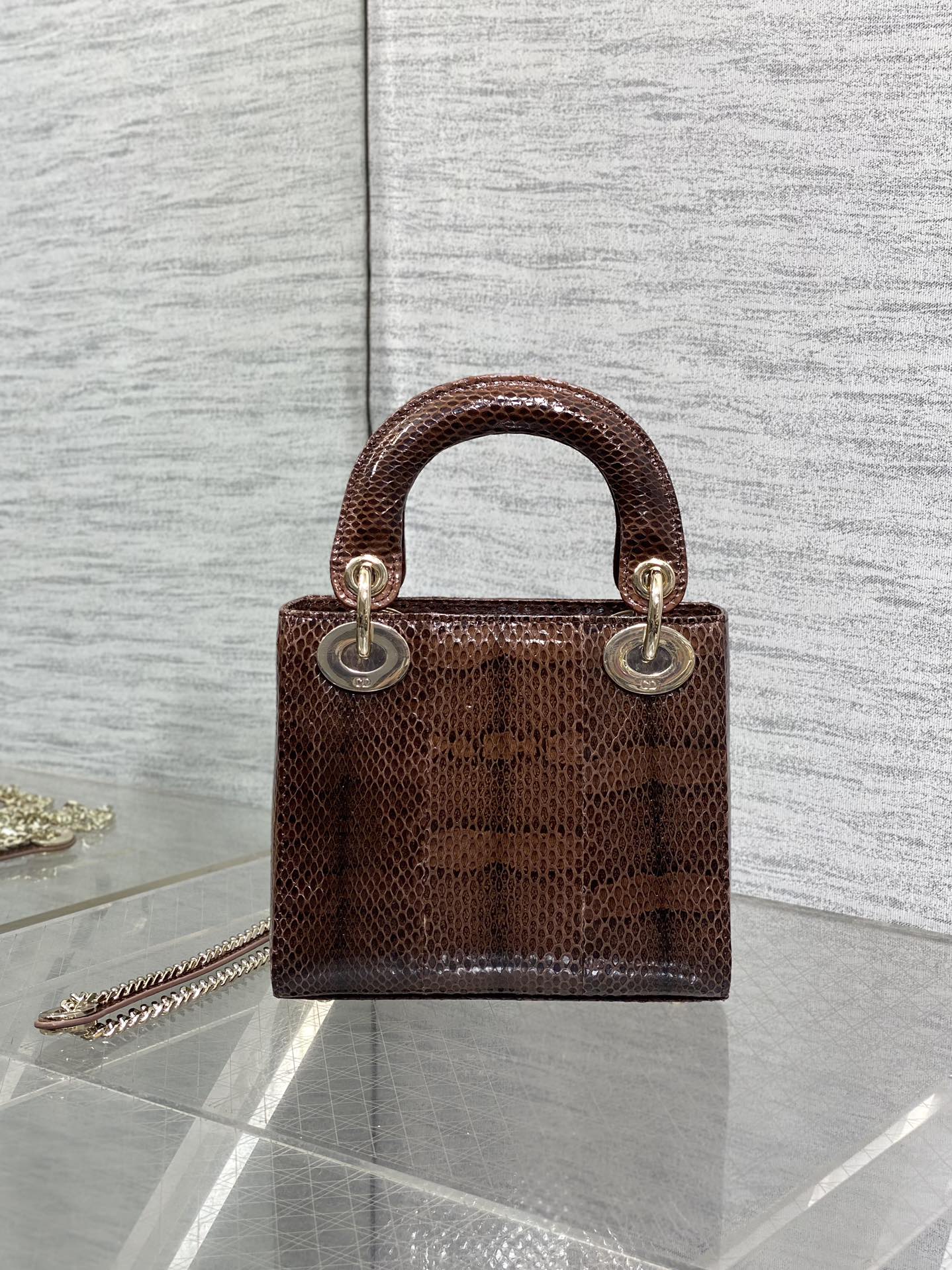 Lady Diana's three-compartment rare snake skin handbag