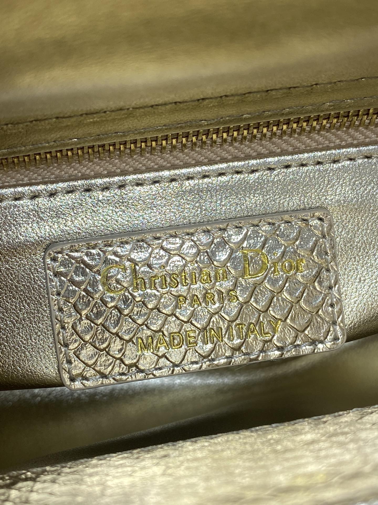 Lady Diana's three-compartment rare snake skin handbag