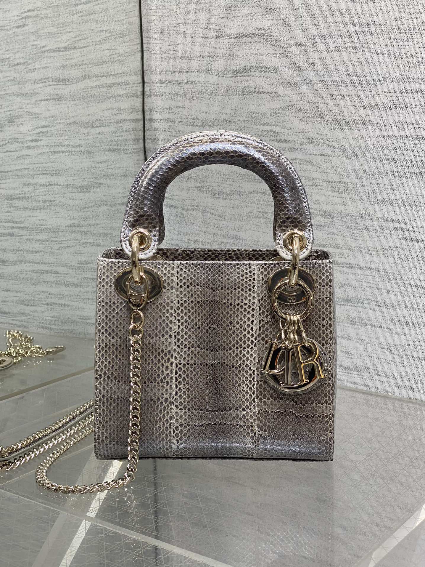 Lady Diana's three-compartment rare snake skin handbag