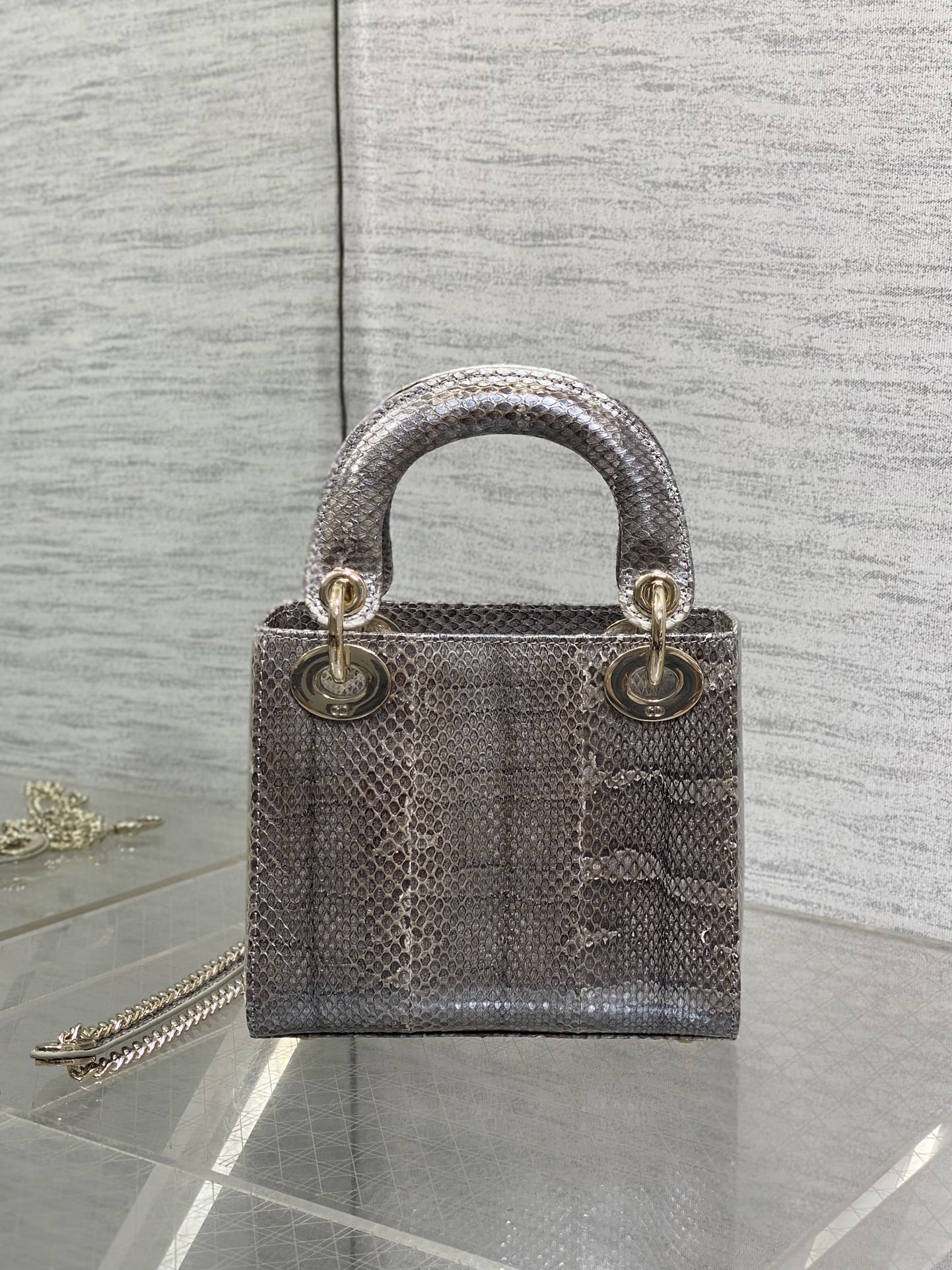 Lady Diana's three-compartment rare snake skin handbag