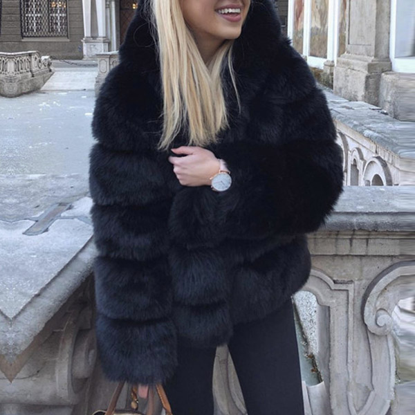 MODERNE KUNSTBONTJAS MET EFFEN KLEUR EN LANGE MOUWEN (MAAT VALT KLEIN)