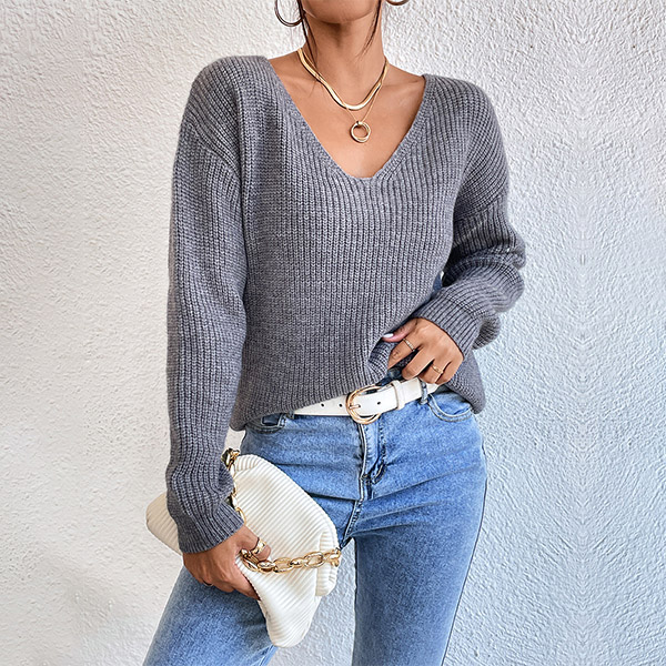 ACHTERKANT KANT GESPLETEN EN KRUISOVER TRUI