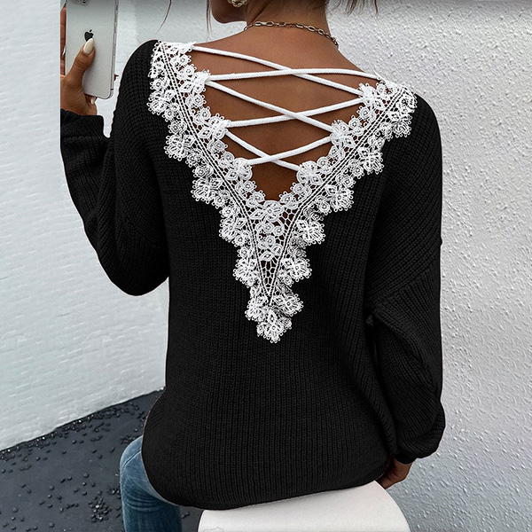 ACHTERKANT KANT GESPLETEN EN KRUISOVER TRUI