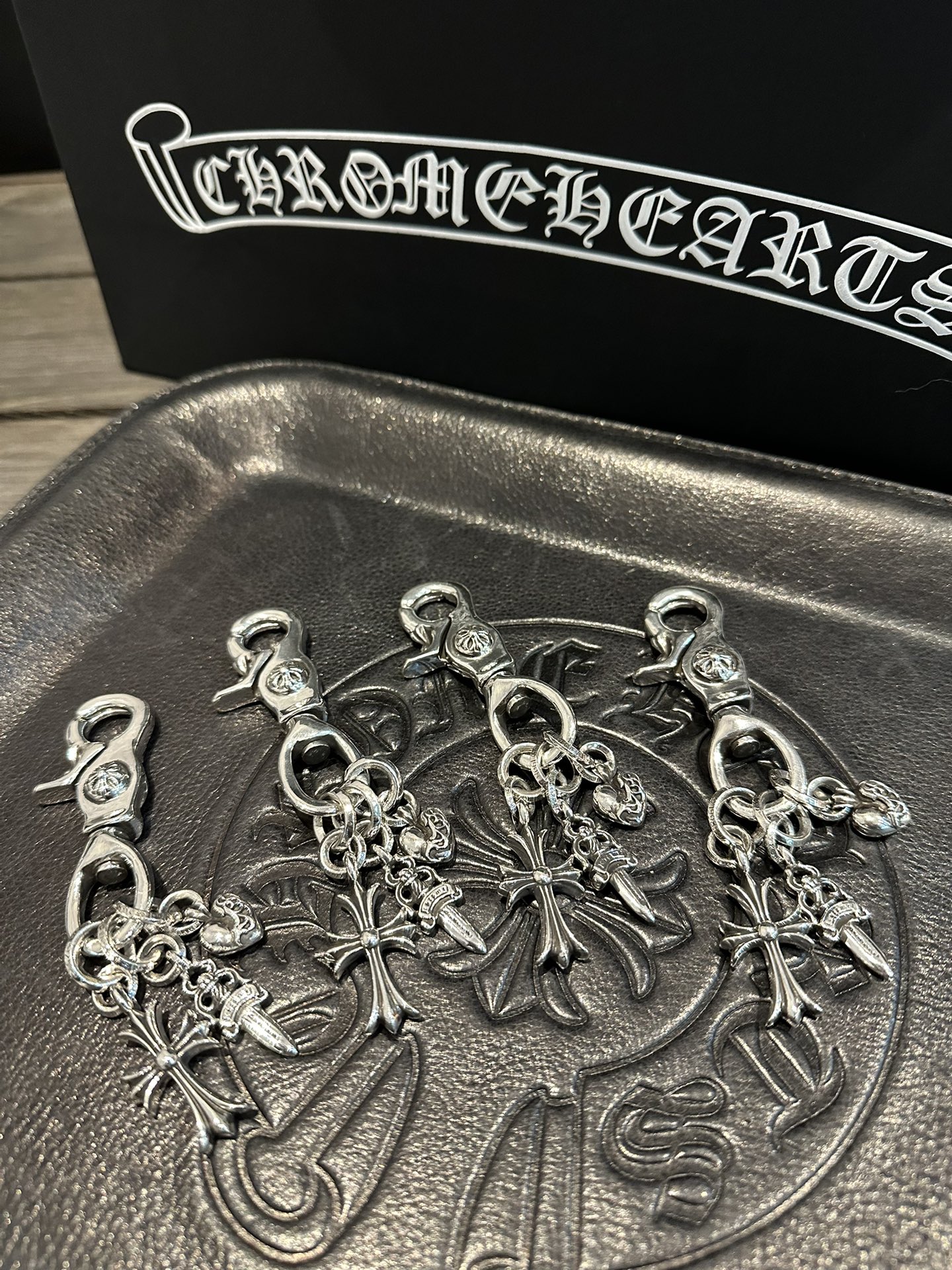 Limited stock available. Rare three-pendant keychain.