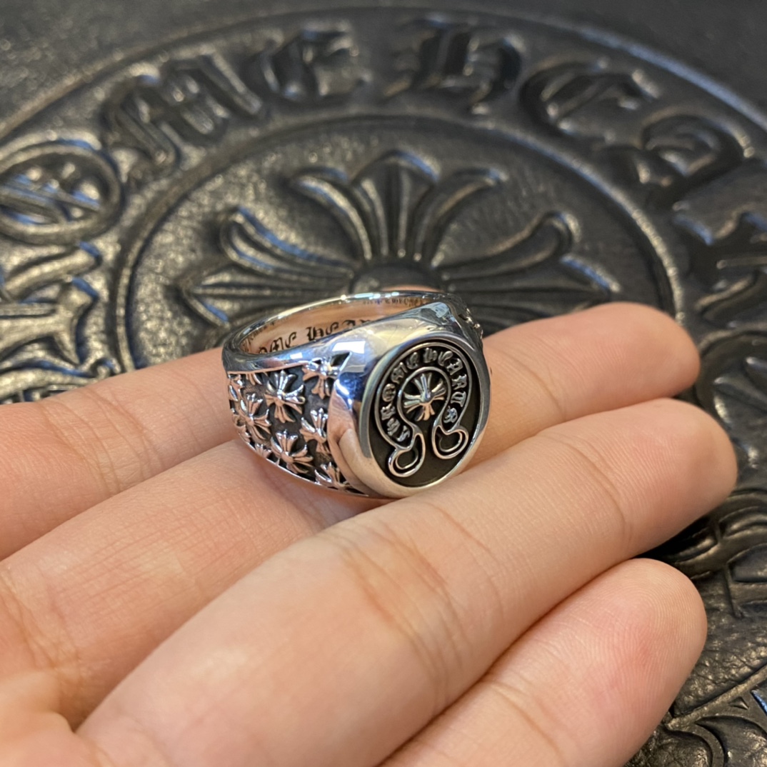 Chrome Hearts Horseshoe Logo Cross RingRare Chrome Hearts piece: Horseshoe Cross Signet Ring925 Sterling Silver with an antique finish; substantial weight and high-quality feel.