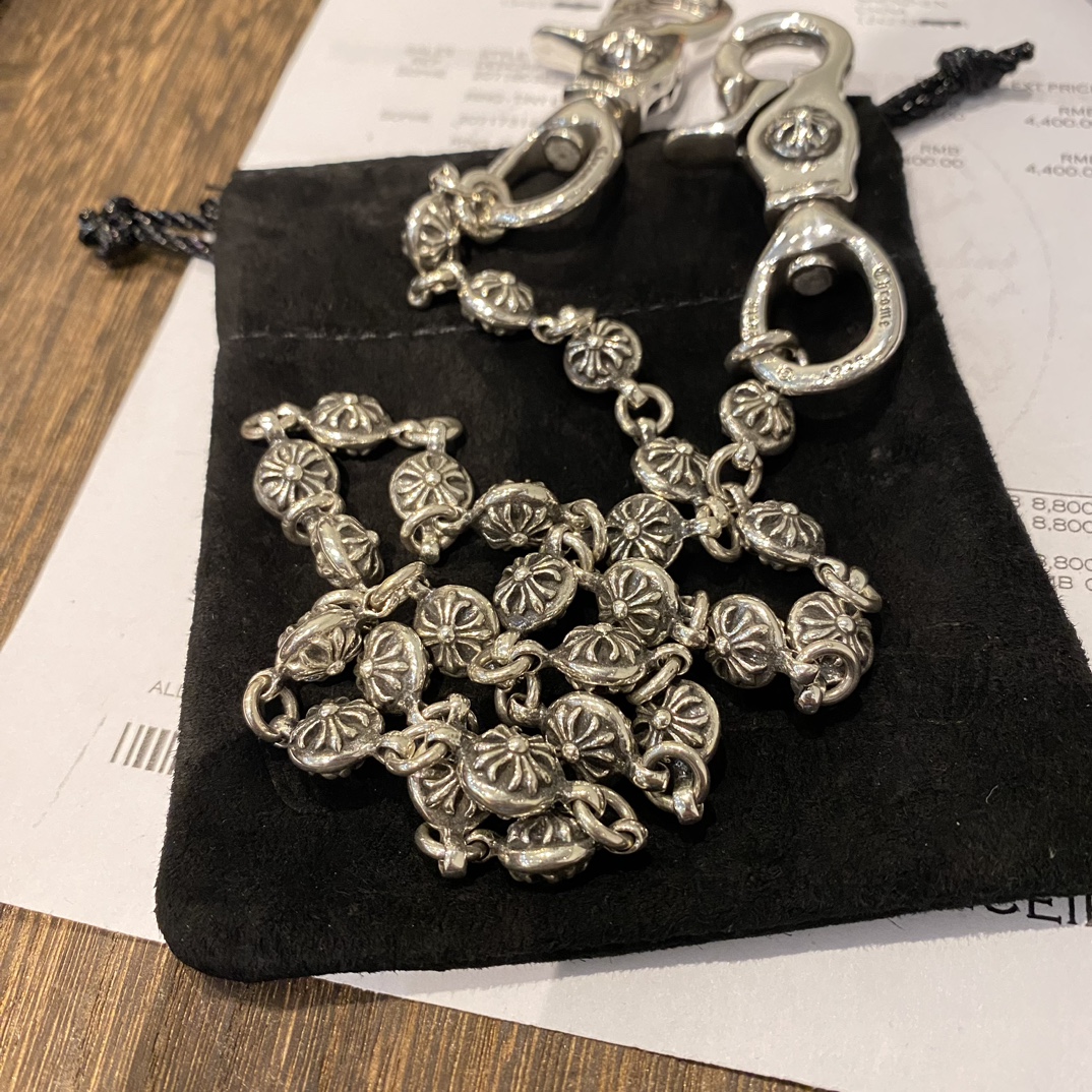 Chrome HeartsCross Flower Ball Bag Chain - Vintage QualityAuthentic Pattern - Authentic Antique Engraving & Oxidation TextureSteel Mold Pattern - Total Length (including lobster clasp): 65cm - Weight: 160g - Entirely 925 Sterling Silver - Material