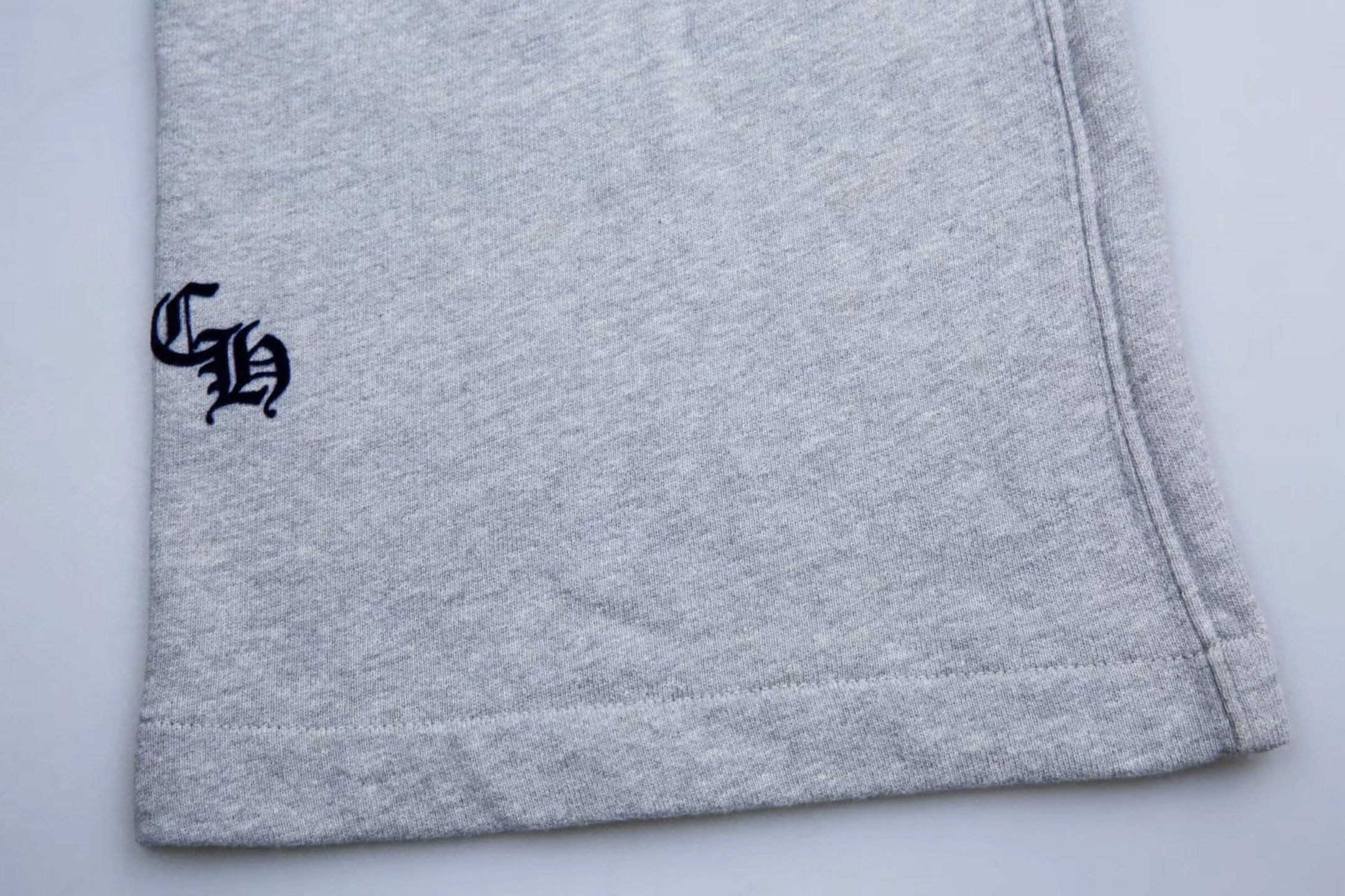 Chrome Hearts Grey Flocked Three-Cross Casual Sweatpants. Made of custom-woven and dyed chunky knit loose fabric, segmented cut. Uses the same electrostatic flocking process as the original garment, not the usual die-cut process; the color may vary d