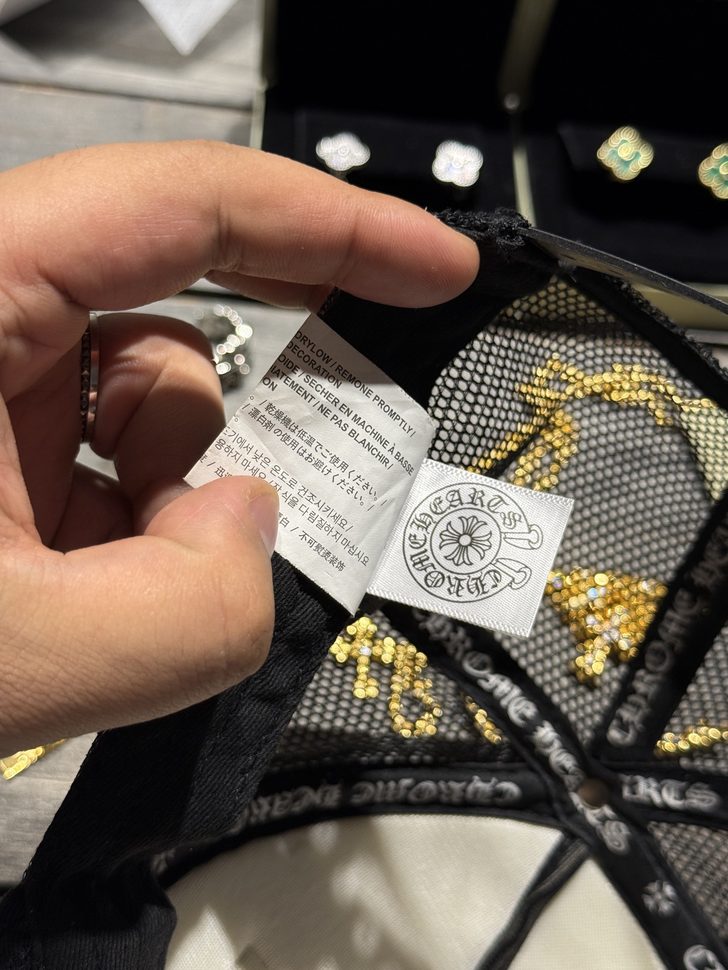 Custom-ordered 30-cross baseball cap with sterling silver buckle and premium car emblem.