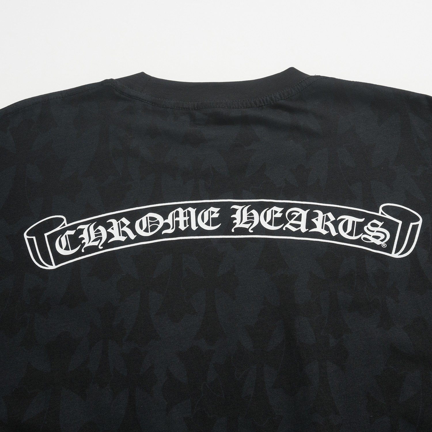 CH Chrome Hearts Long-Sleeve T-Shirt with Dark Cross PrintCustom-dyed fabric; horseshoe print on the chest pocket; scroll and Sanskrit print on the back; cross print on the shouldersSizes: S, M, L