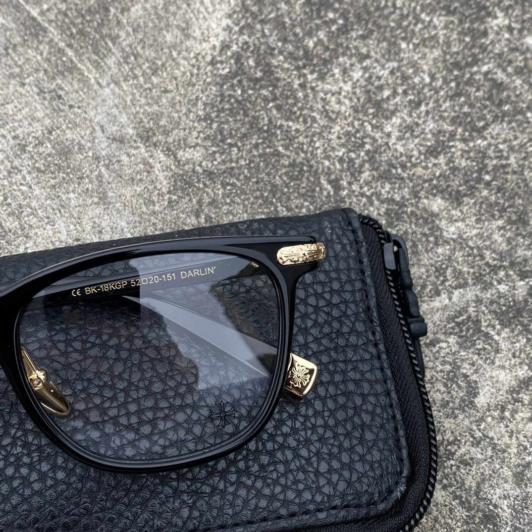 Chrome Hearts Gold Cross Flower EyeglassesChrome Hearts is the epitome of luxury. Their intricate craftsmanship and design exude sophistication. A universally flattering style, these glasses are elegant, clean-cut, and refined, perfect for both for