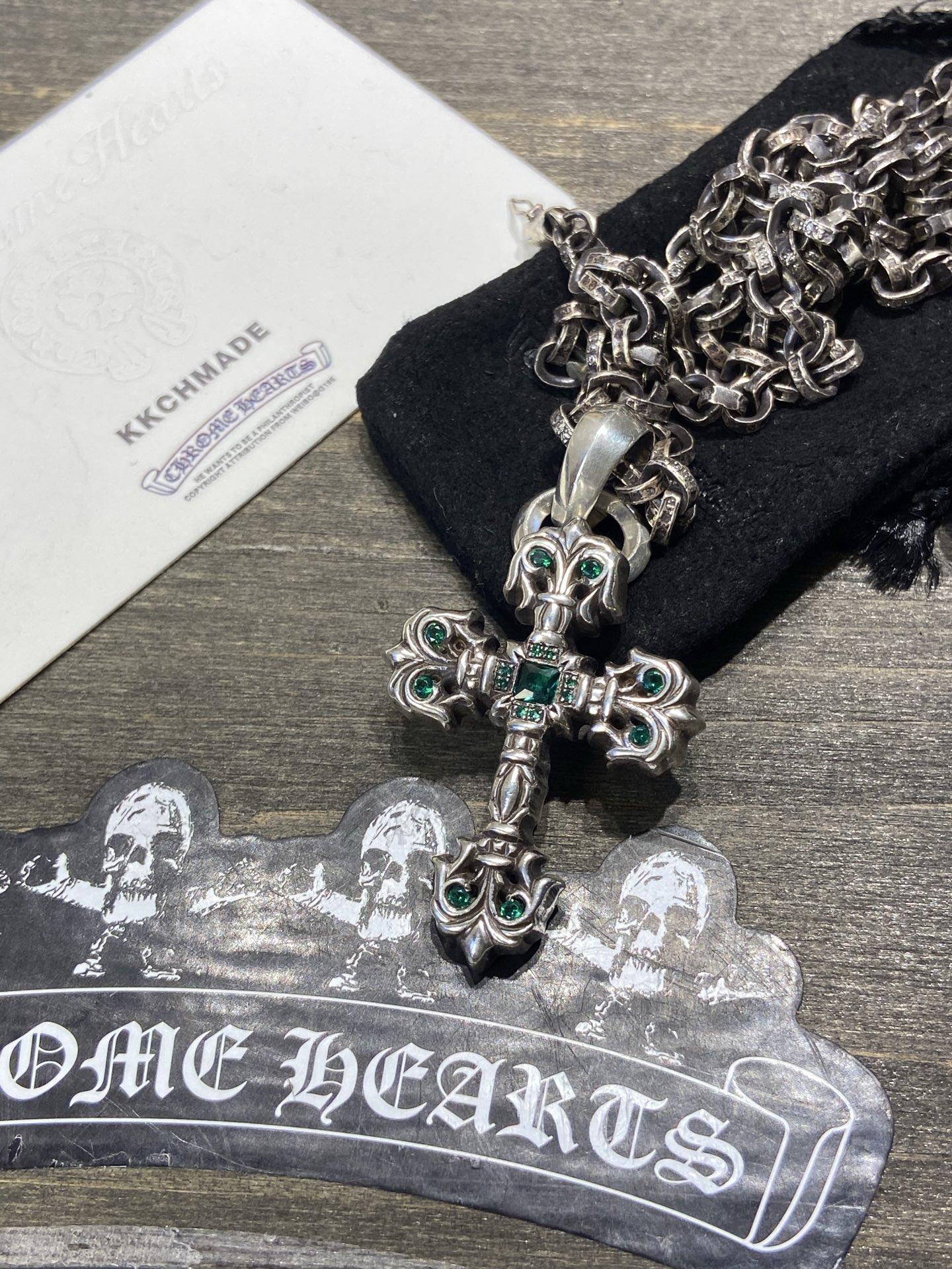 Customer order: Medium-sized flame cross necklace with green diamond setting + PP letter chain