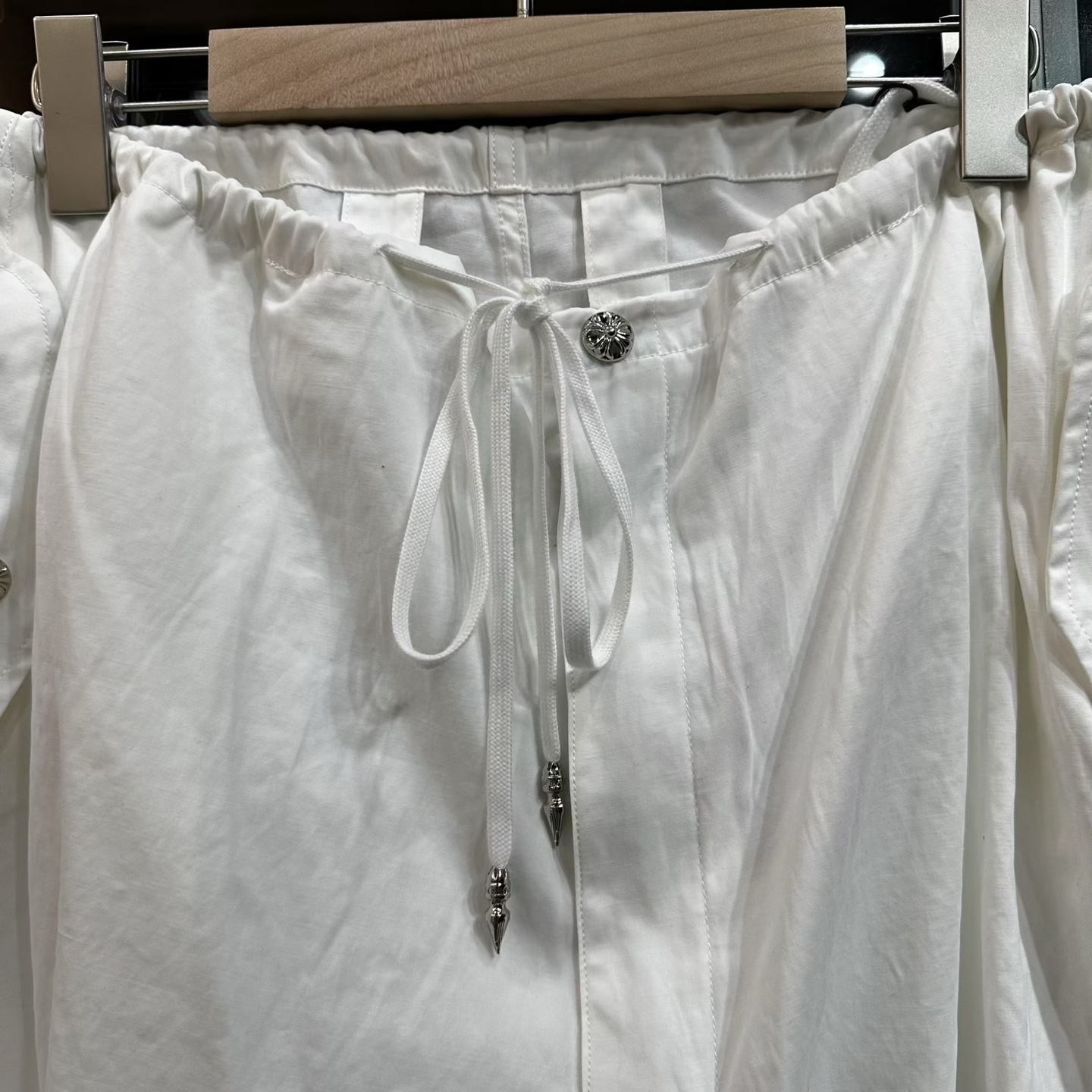 Chrome Hearts Heavyweight Paratrooper Pants with Colorful Crosses. A relaxed, laid-back fit, suitable for waist sizes 66-100cm. The fabric is custom-woven and dyed, requiring a carbon-brushed finish on the front followed by a brushed finish (resultin