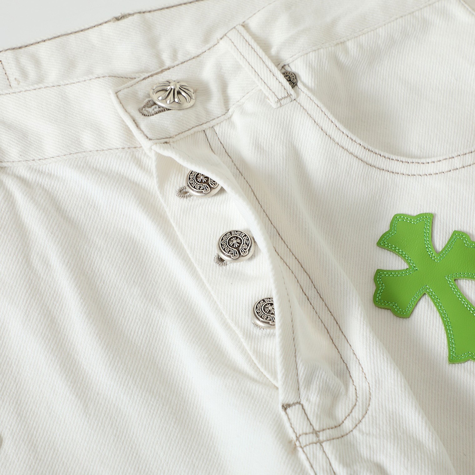 Horsehair Apple Green Cross JeansWe've released men's and women's versions of these jeans, as they look great on women too!The cross is made from genuine horsehair.Exclusive, authentic version available. Feel free to compare from any angle!Th