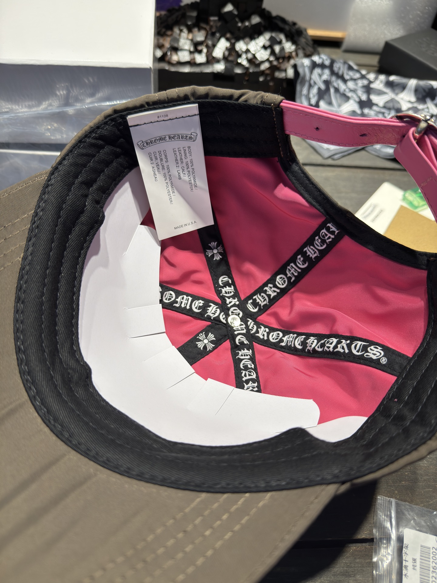 Custom-ordered heart-shaped baseball cap with exclusive D-ring buckle/cross top buckle + premium car emblem.