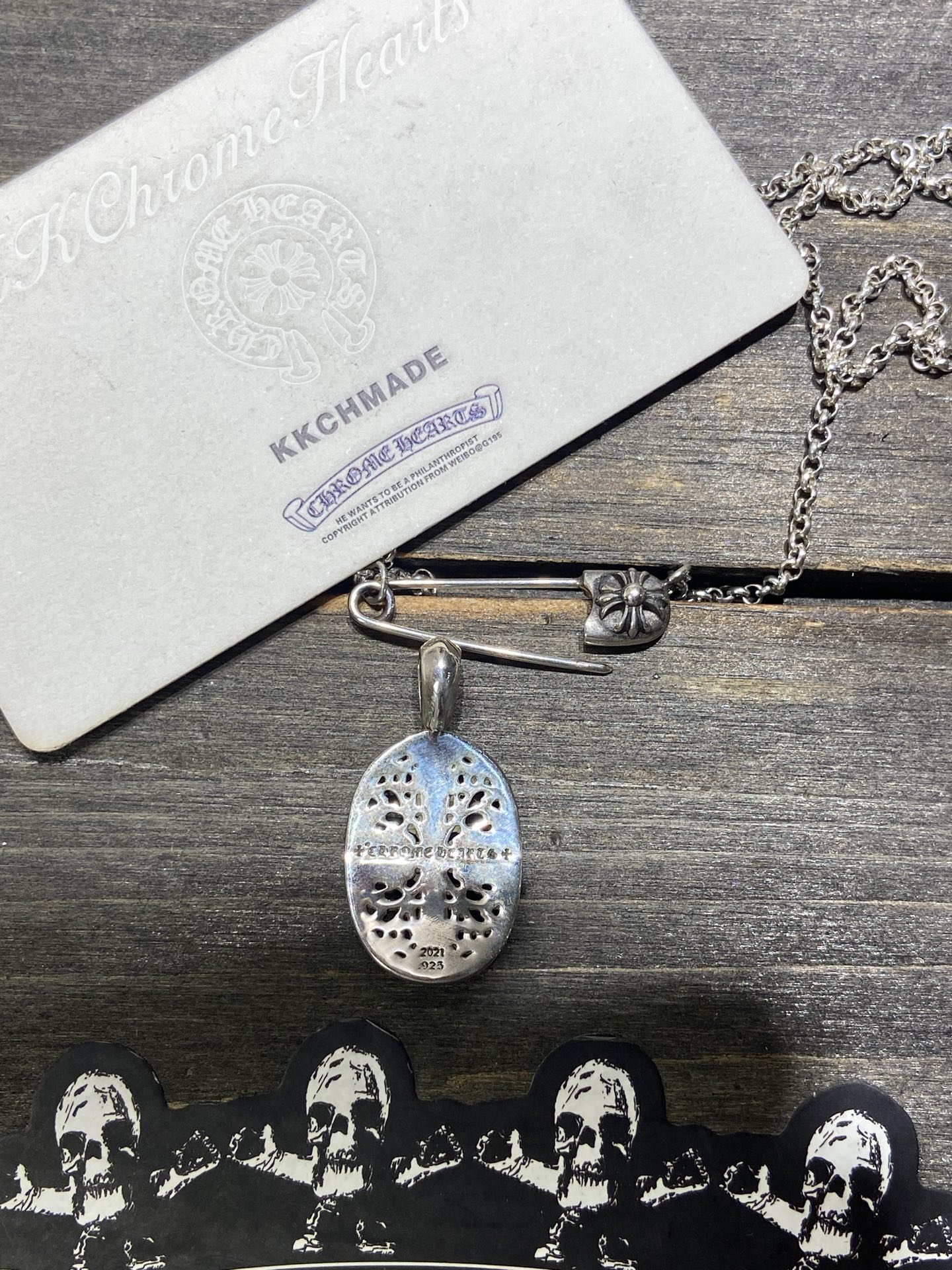 Cross vine pendant, available now.