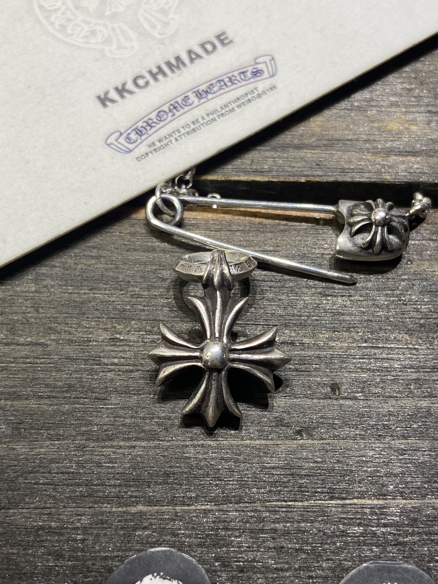 Small cross flower pendant, in stock.