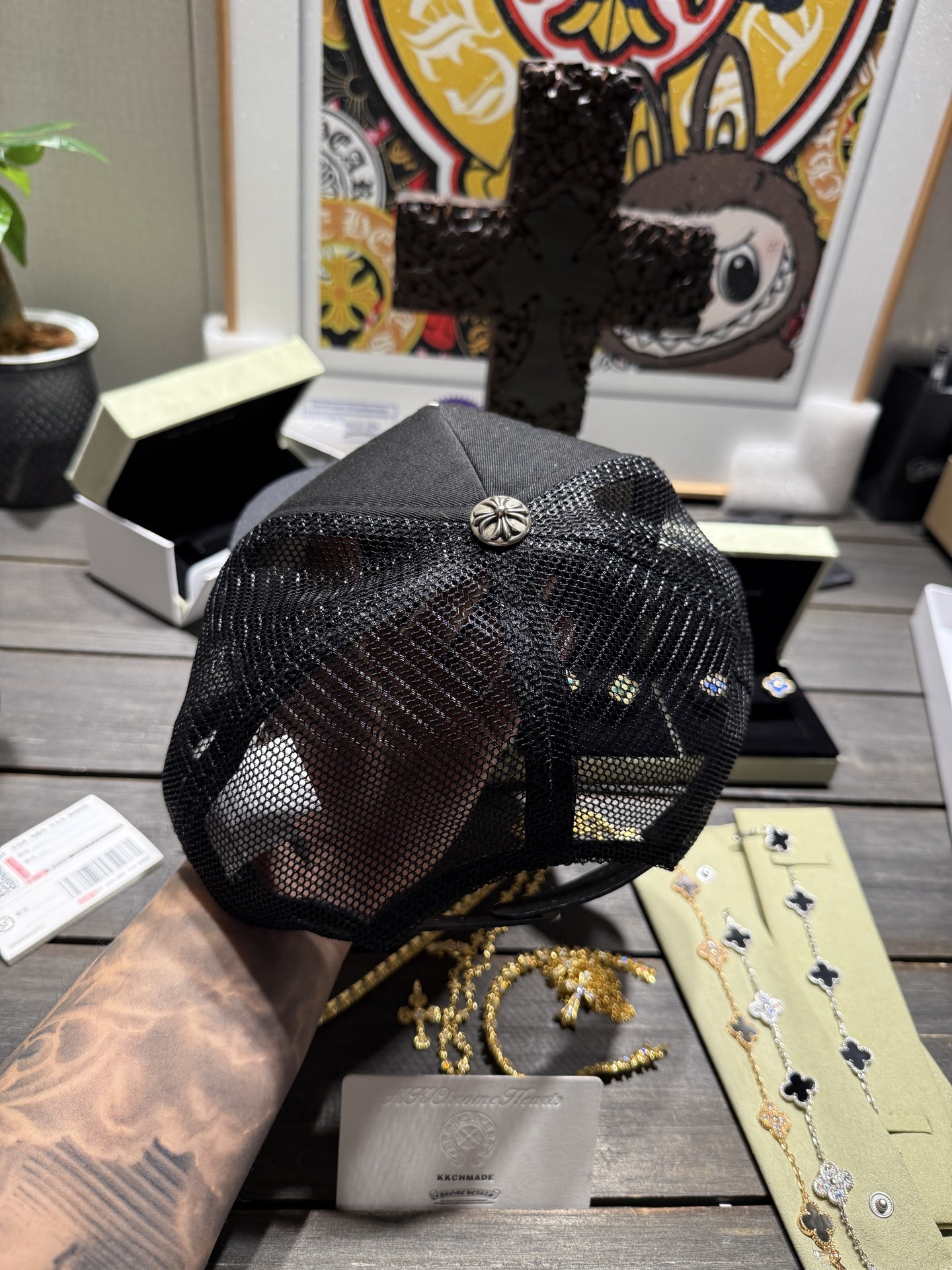 Custom-ordered 30-cross baseball cap with sterling silver buckle and premium car emblem.